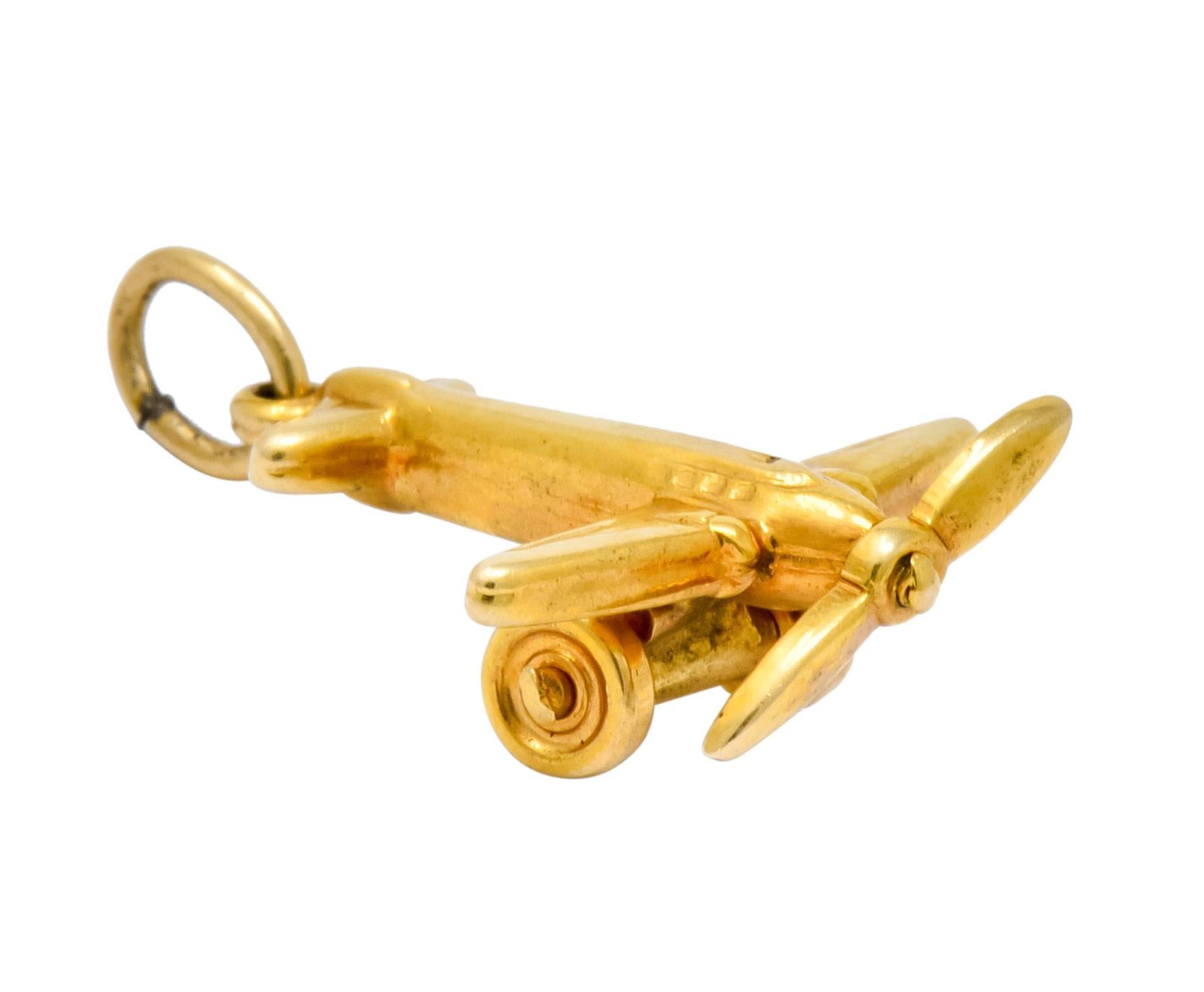 Art Deco Articulated 14 Karat Gold Propeller Plane Charm, circa 1930 In Excellent Condition In Philadelphia, PA