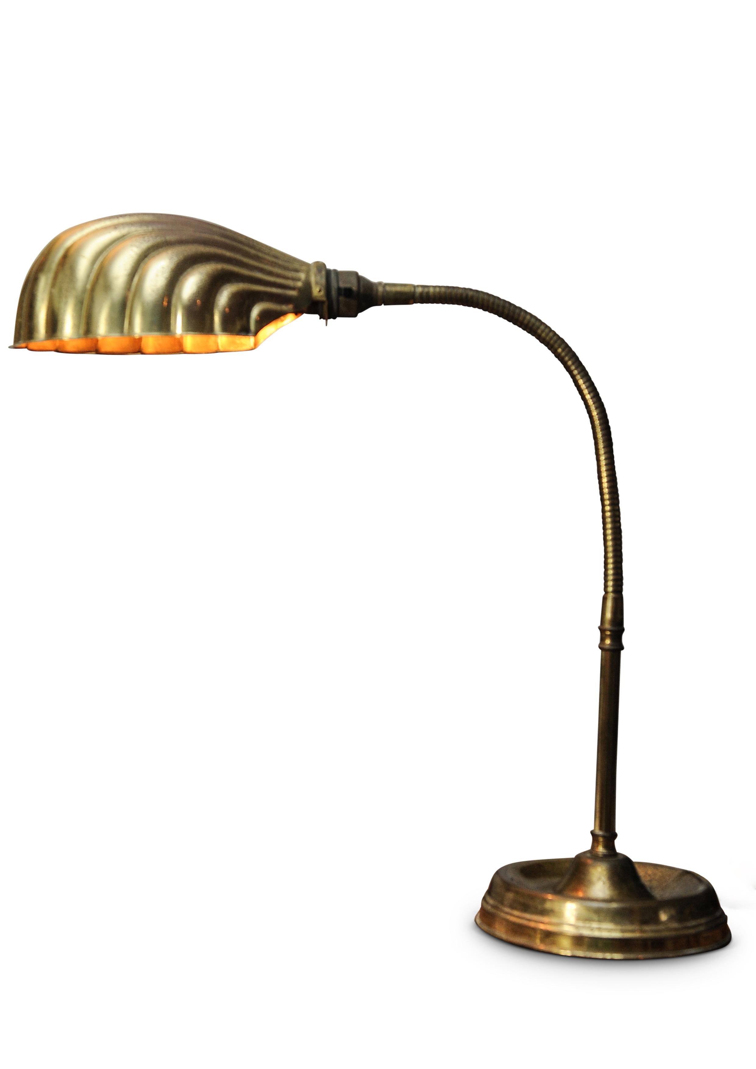 Hand-Crafted Art Deco Articulated Brass Gooseneck Desk Lamp with Decorated Shell Shade, 1920s