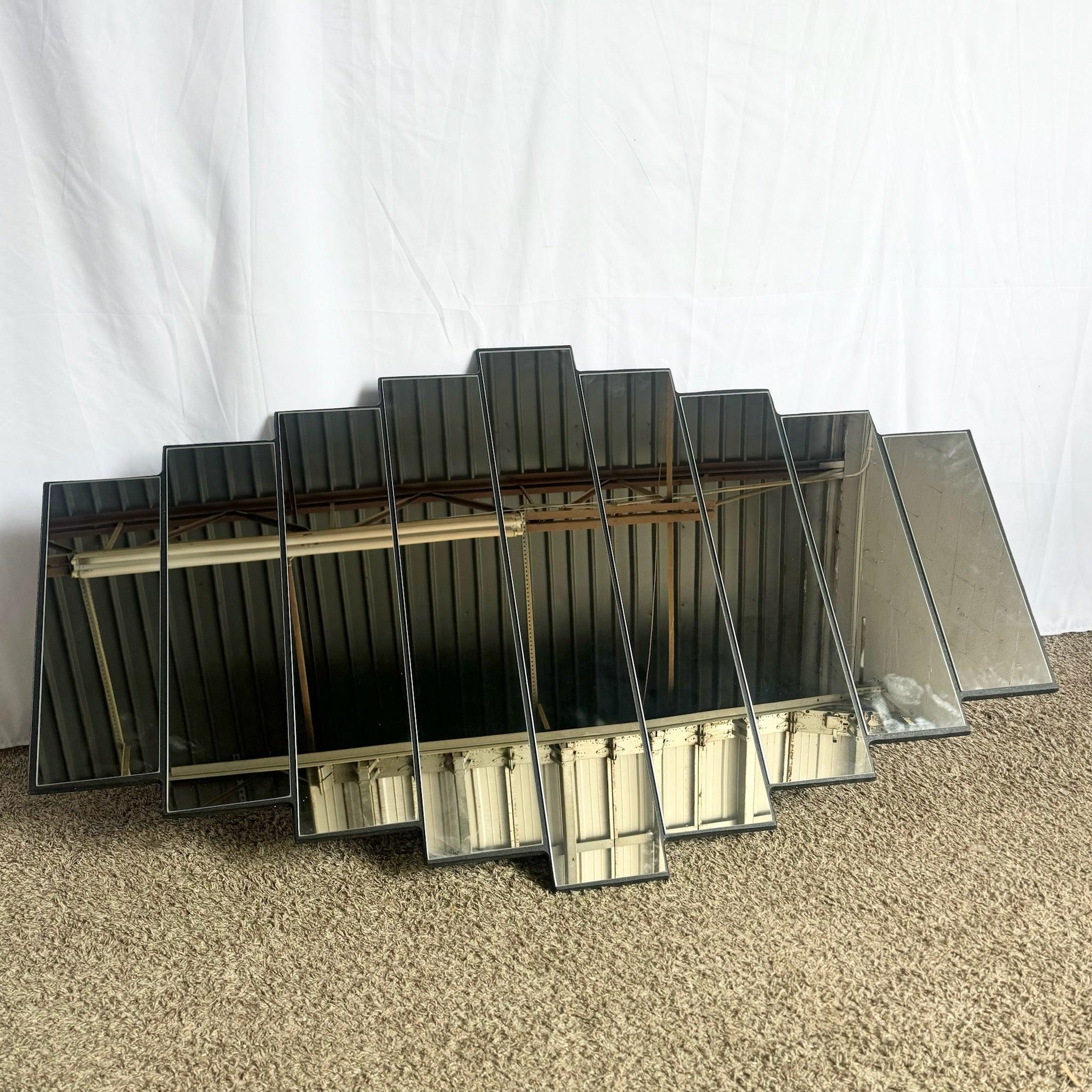 Art Deco ascending wall mirror with stepped silhouette and layered mirrored panels on wood—1980s glam inspired by Miami's iconic architecture.
 
 We sell items as acquired, without restoring or repairing. Vintage pieces may have age-related wear.