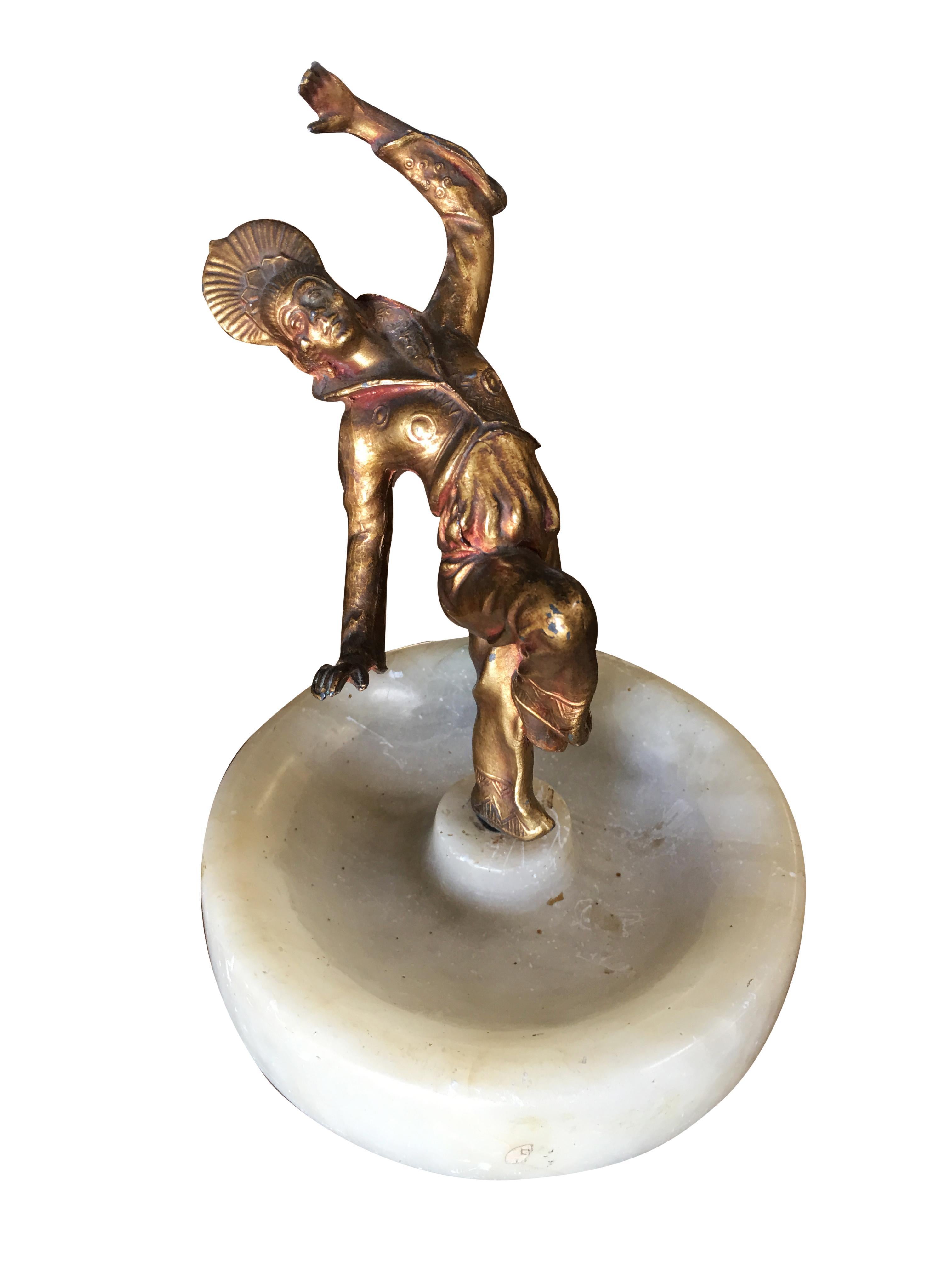 Marble ashtray/ring tray with a female Harlequin dancer spelter metal female statue, circa 1920.