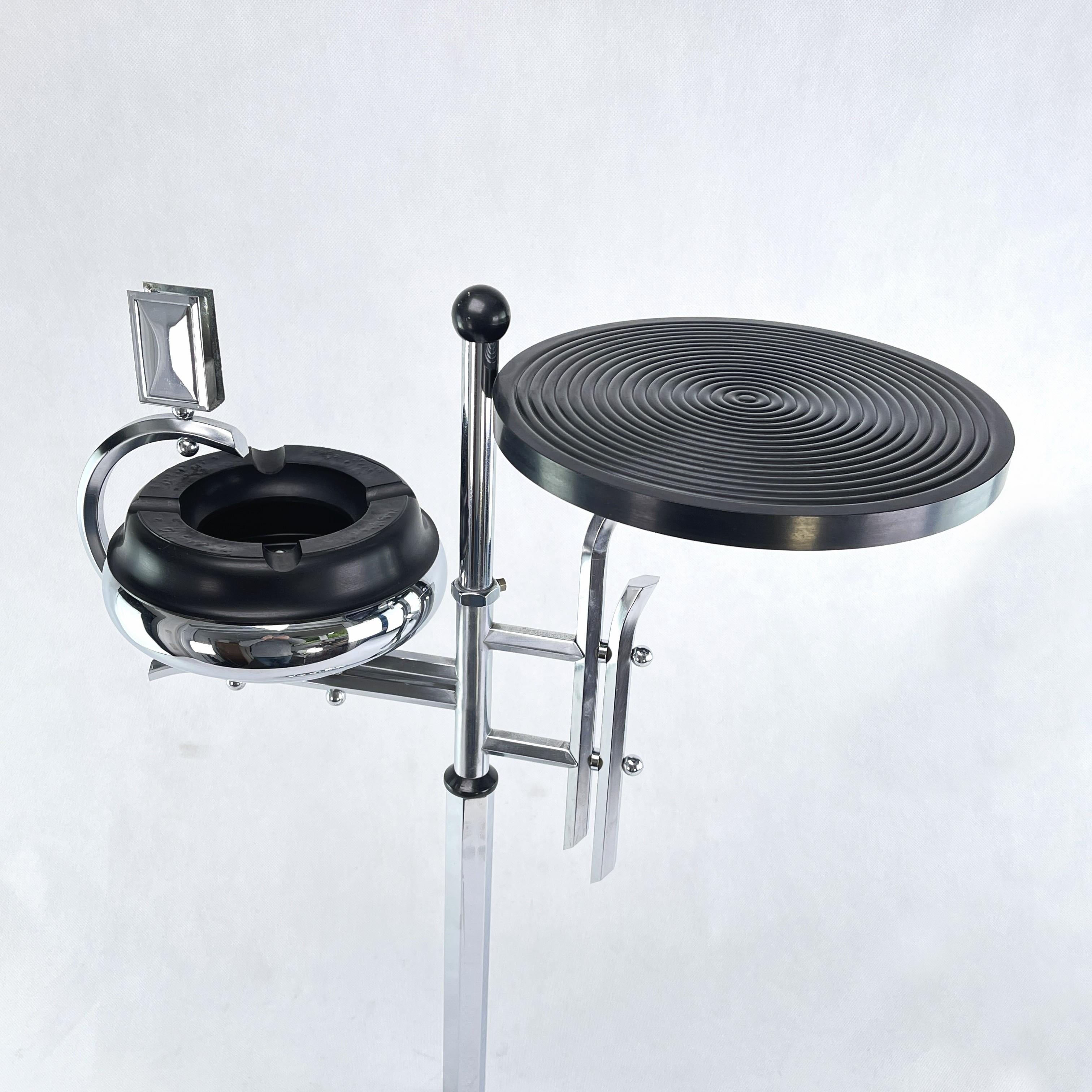 Art Deco ashtray stand

This beautiful and rare Art Deco Ashtray Stand from the 20s/30s is in the streamline modern art deco style. The designer of this extraordinary object has succeeded in combining functionality, design, style and aesthetics.