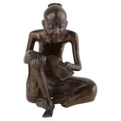 Statuetta in bronzo in stile Art Déco raffigurante uno studioso annamita, Indocina, 1920 circa