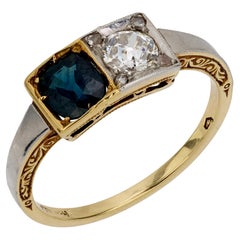 Anillo Art Decó austriaco de oro amarillo Toi Et Moi de 14k con diamante y zafiro