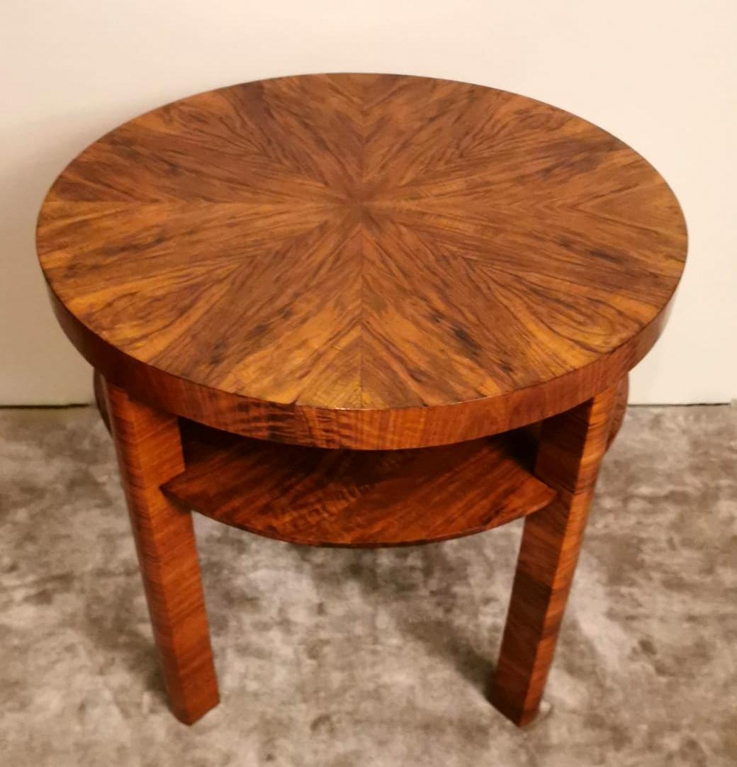 We kindly suggest that you read the entire description, as with it we try to give you detailed technical and historical information to ensure the authenticity of our objects. 
Refined and elegant Austrian Art Deco coffee table in walnut; it has a