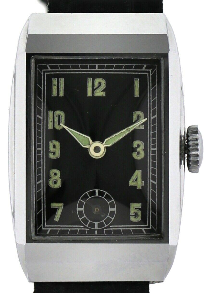 For those gents out there who desire a less than generic looking watch, who aspire for something not only classy but very distinctively Art Deco then this maybe the timepiece for you! An extremely rare opportunity to acquire a perfect condition Art