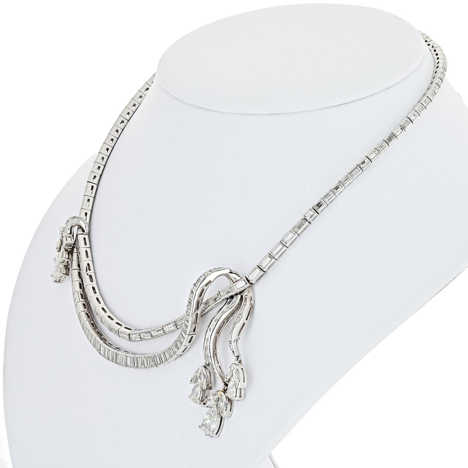 Extravagance is the single word that describes the lustrous Art Deco time period. Abstract designs of geometric shapes are intellectually fused together to create fascinating designs. This quintessential dazzling necklace is crafted in platinum and