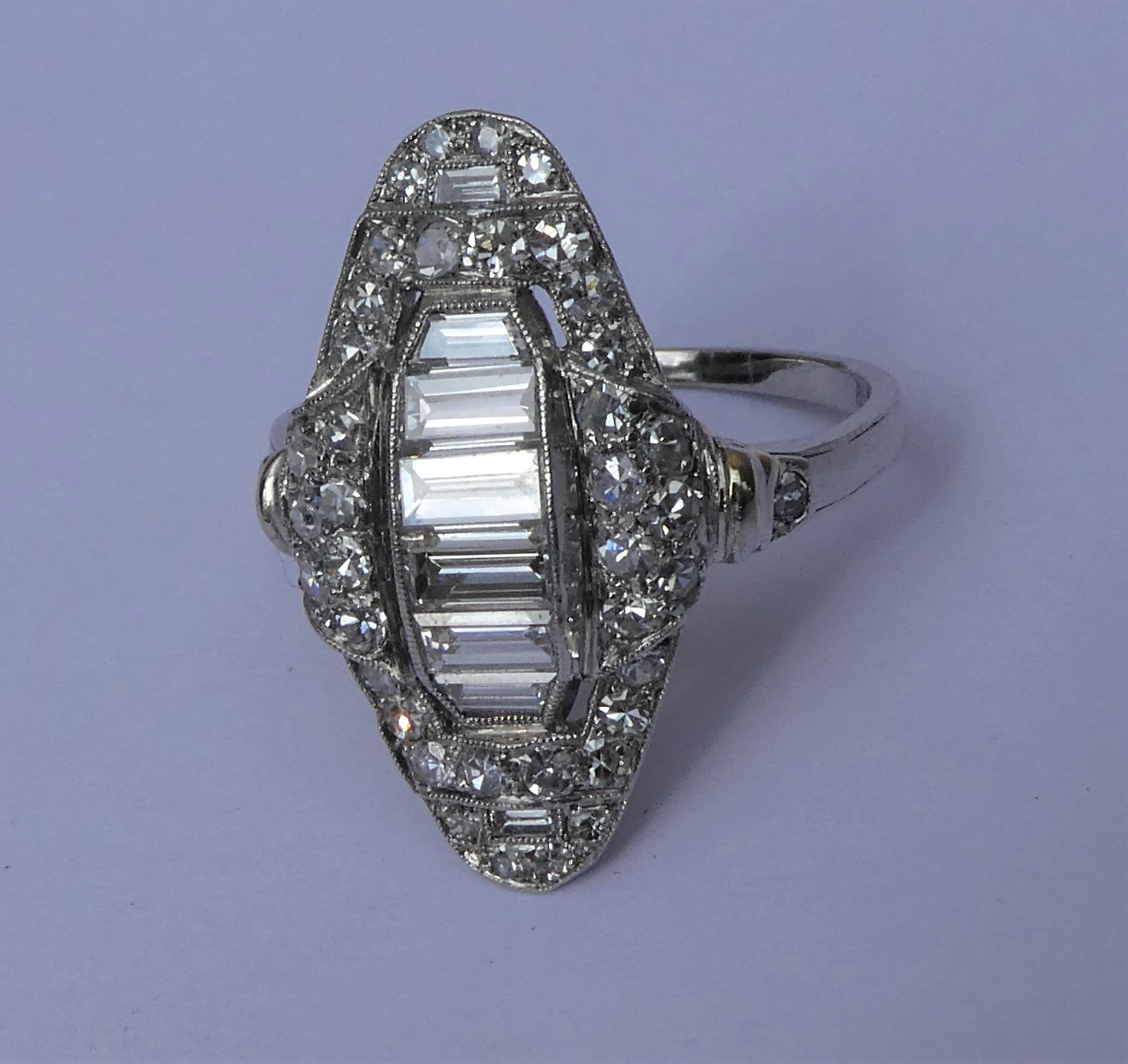 Art Deco Baguette and Round Diamond Platinum Cluster Ring In Excellent Condition For Sale In Munich, DE