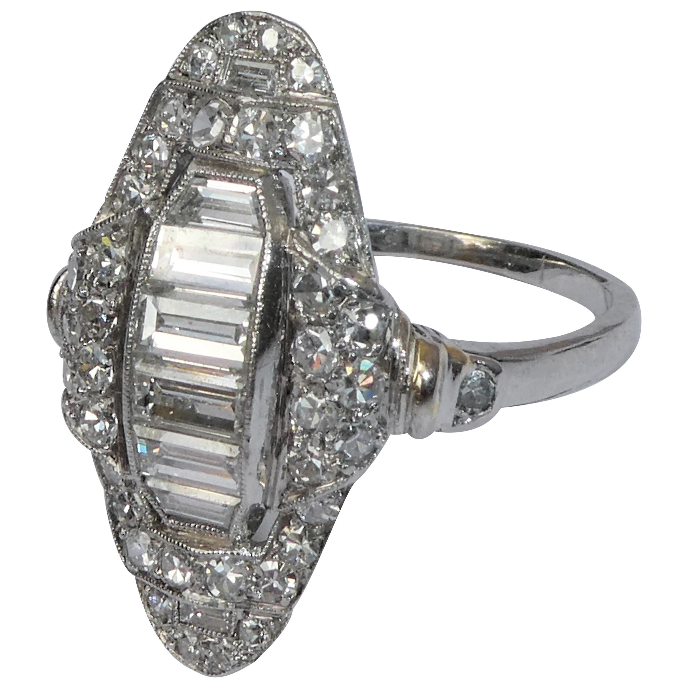 Art Deco Baguette and Round Diamond Platinum Cluster Ring For Sale