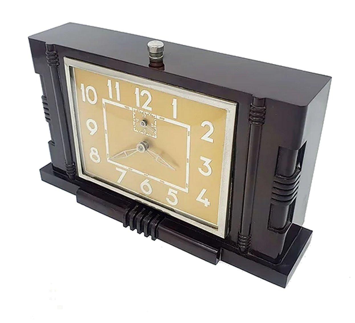 Impressive large 1930s Art Deco Bakelite table/ mantle clock by the French company Japy. Great geometric Bakelite case and numerals. Keeping very good time. Alarm doesn't work unfortunately so time piece only. 30 hour movement. Case is in great