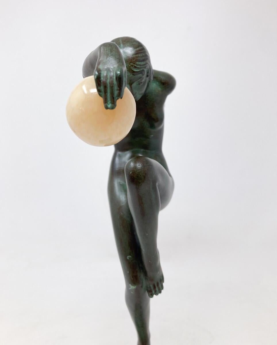 Art Deco Ball Dancer Signed Denis, Pseudonym Of Marcel Bouraine. Metal With Green Patina, Onyx Balls - Produced By The Max Le Verrier Workshops.