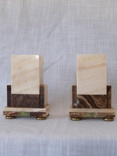 Art Deco Banded Onyx Marble Bookends with Brass Feet, Pair, circa 1930s.