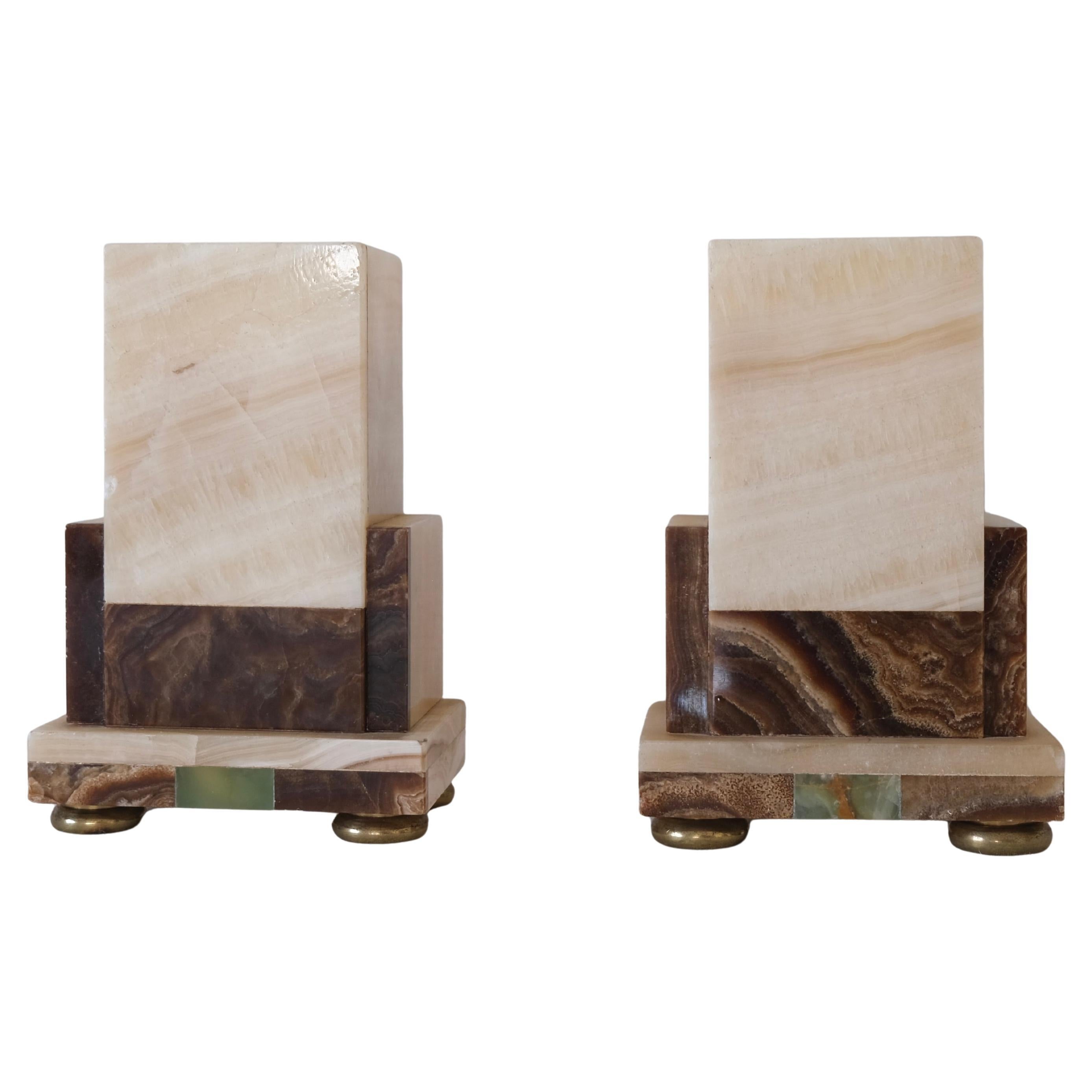 Art Deco Banded Onyx Marble Bookends with Brass Feet, Pair, circa 1930s.
