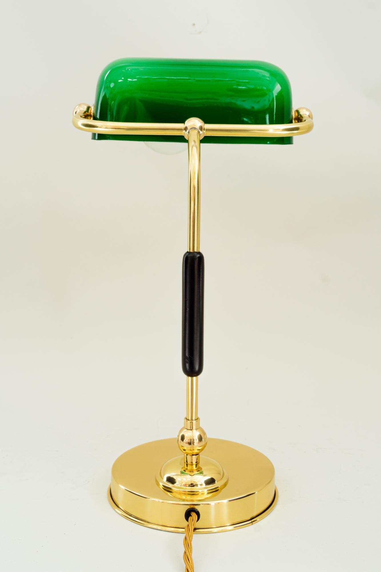 Art Deco banker lamp vienna around 1920s.
Brass polished and stove enamelled.
 