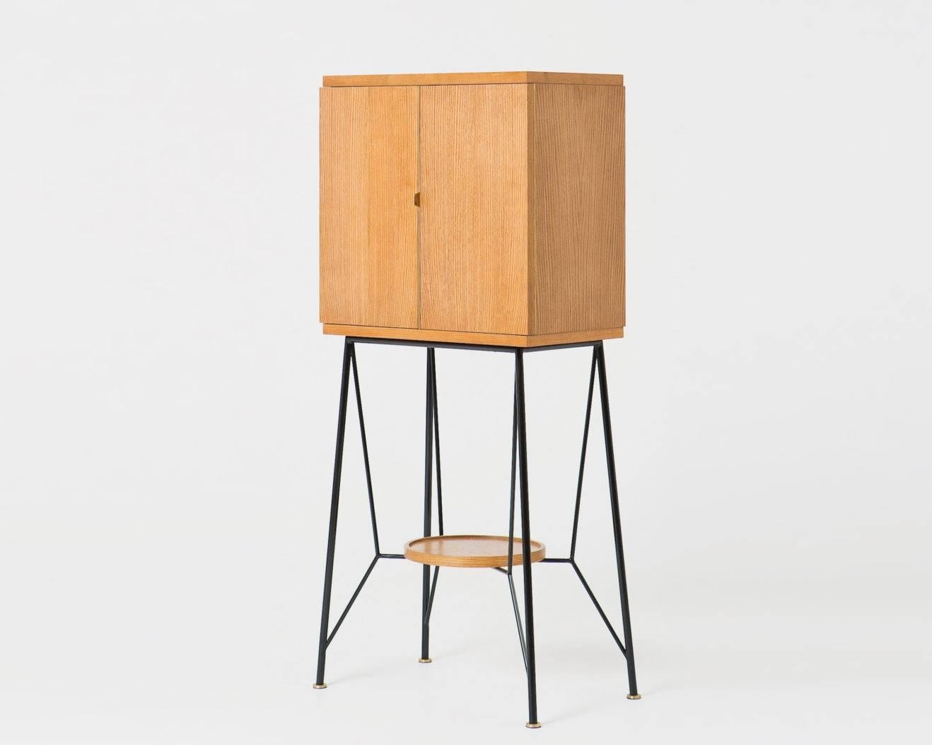 Bar cabinet by Russian designer Dmitry Samygin

Oak veneered, metal and brass
Measures: 160 cm x 66 cm x 44 cm

After studying Applied Arts at the National University of Art and Industry, Stroganov, Dmitry Samigyn quickly collaborated with his