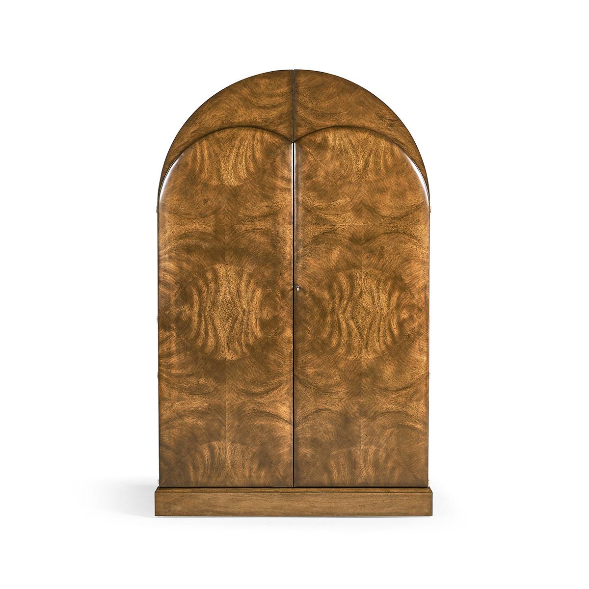 Made from crotch cerejeira and flat-cut mahogany veneers, this limited edition cabinet is all about lasting beauty. The natural cerejeira finish makes the wood look even more beautiful, turning the cabinet into something timeless and organic.

Open