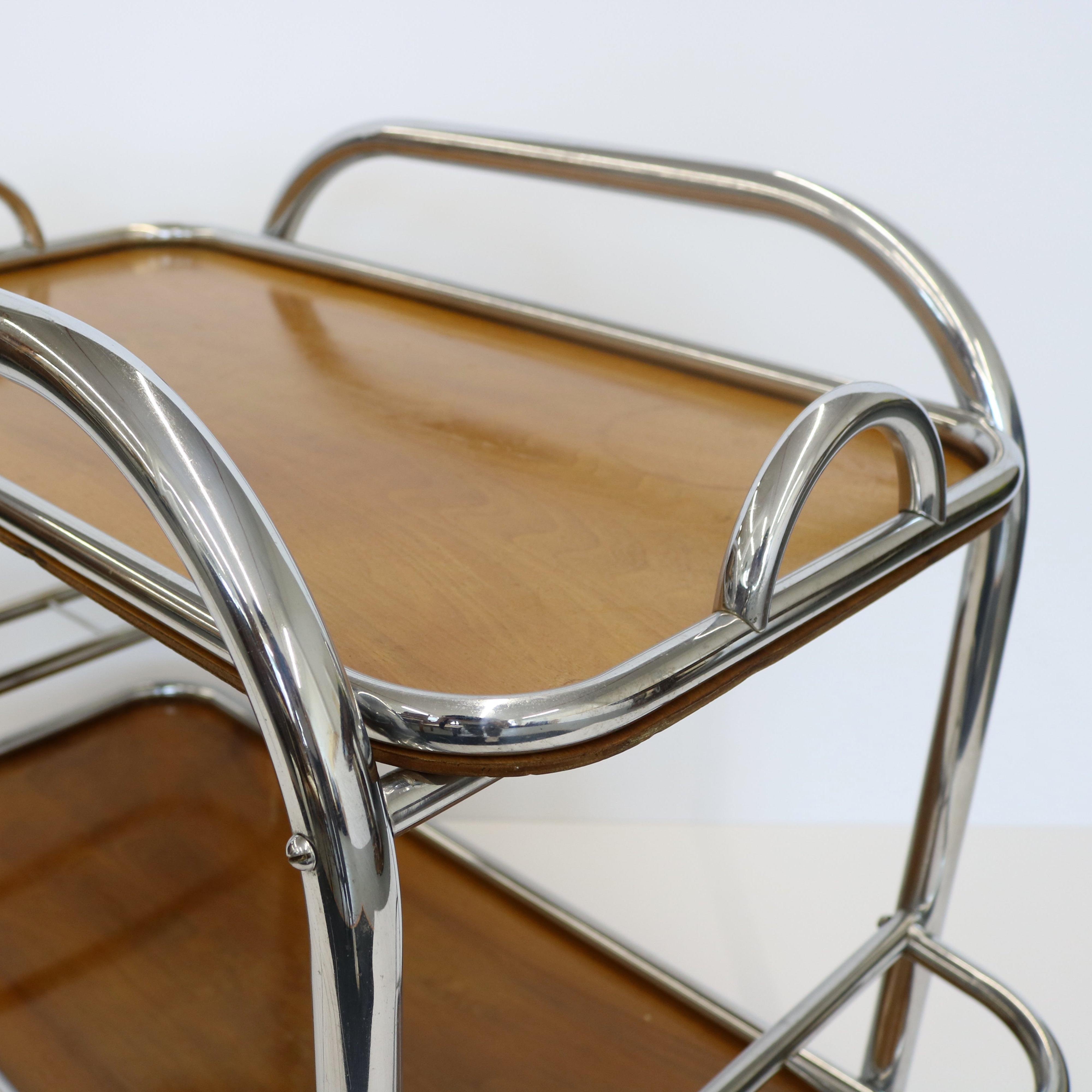 An Art Deco bar cart designed by renound French architect Robert Mallet-Stevens. (1886-1945). Stevens was the founder of the UAM, the Union des Artistes Moderne, and was a leading proponent of Modernism in the inter-war period of the 1920's and 30's