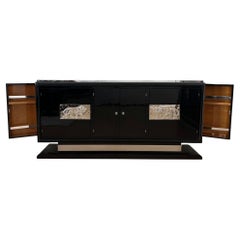 Credenza da bar Art Déco, lacca nera, applicazioni di leoni cromati, Francia circa 1930