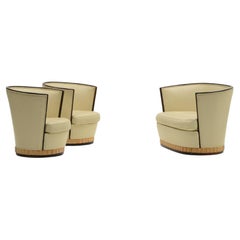 Art Deco barrel chairs and sofa, France 1930s.