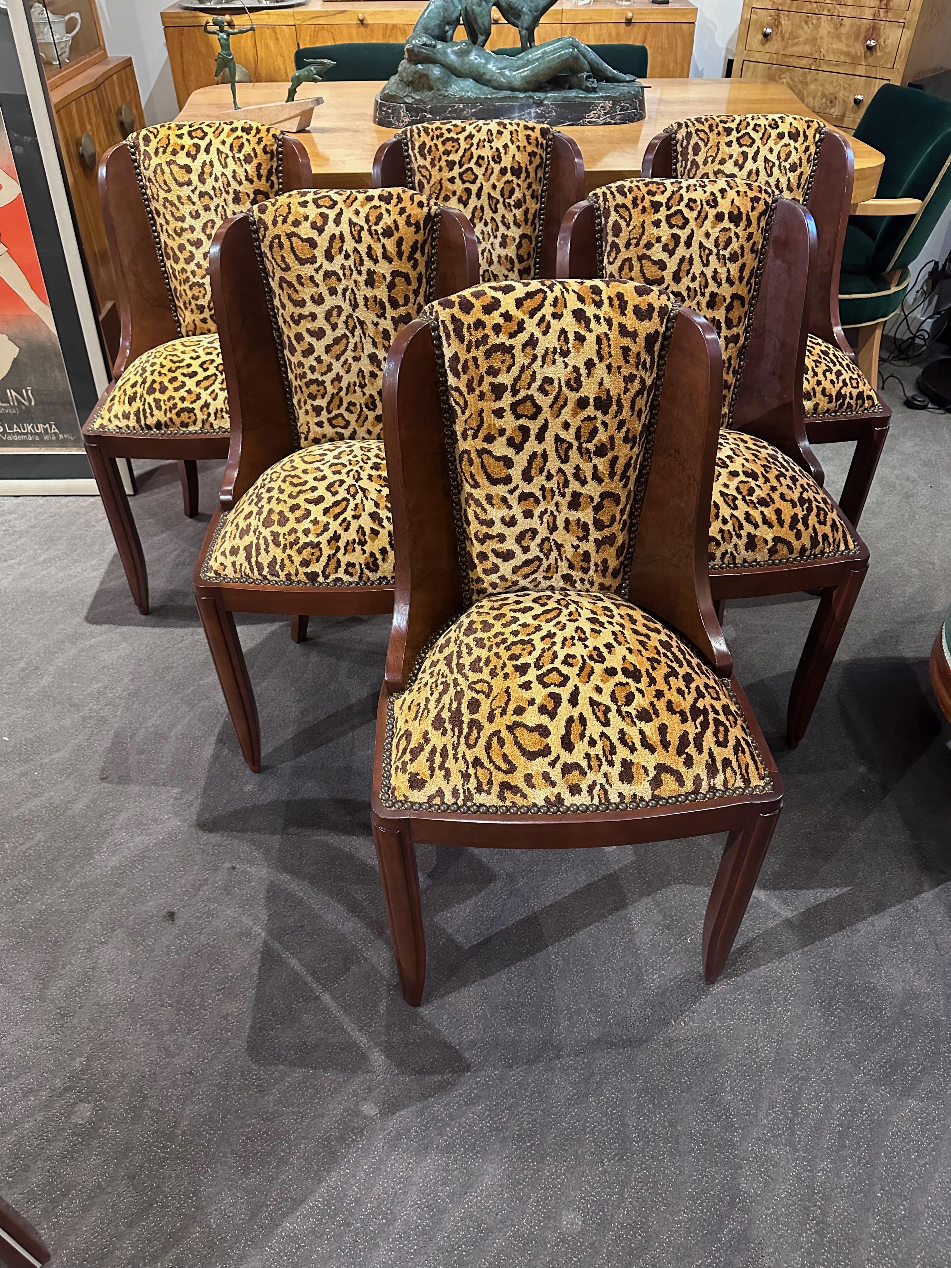 Art Deco Barrel dining – office chairs with custom leopard fabric. 6 Original French chairs with meticulous care. Each chair was disassembled, revealing the intricate blend of hardwood, and original springs, and refinished so they could be updated
