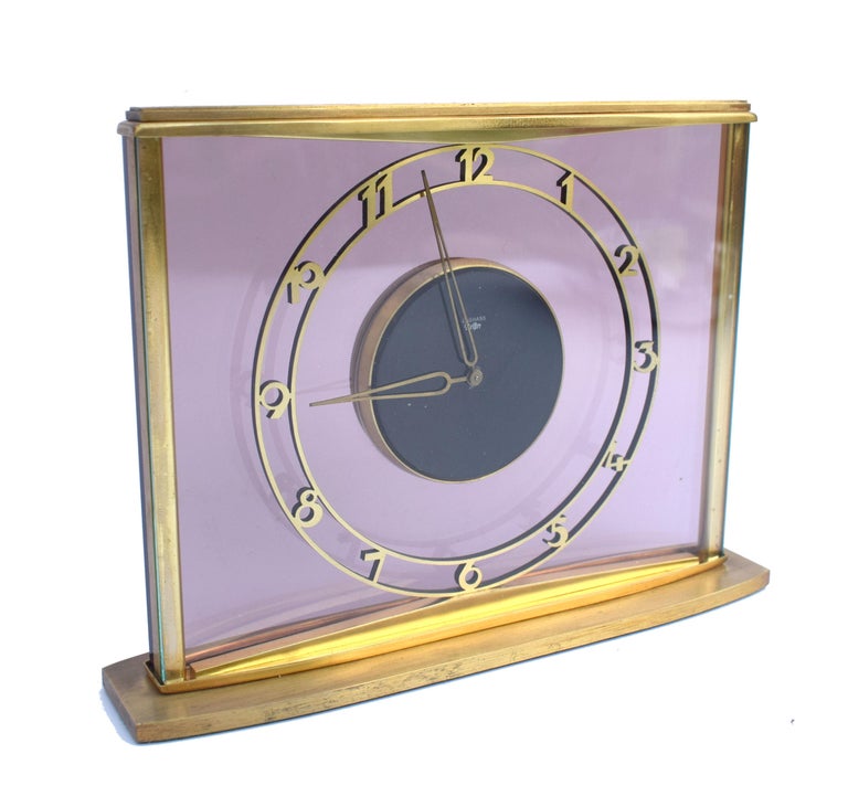 For your consideration is this beautiful modernist 8 day clock by German clockmakers Junghans, dating to the late 1930s this time piece works perfectly for both modern and period interiors. On picking this clock up one can't ignore the weight which