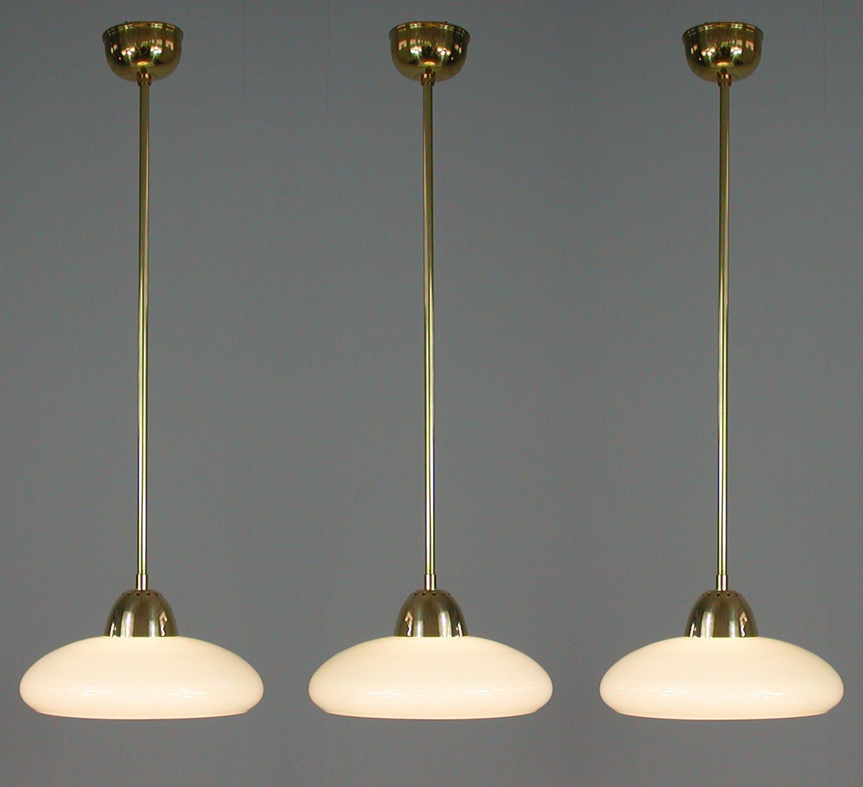 Art Deco Bauhaus Cream Opaline Glass and Brass Pendants, Germany 1930s In Good Condition For Sale In NUEMBRECHT, NRW