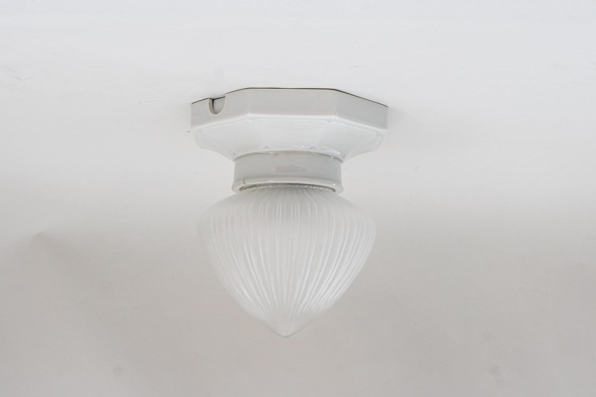 Art Deco Bauhaus porcelain ceiling lamp with original glass, circa 1920s
Original condition.