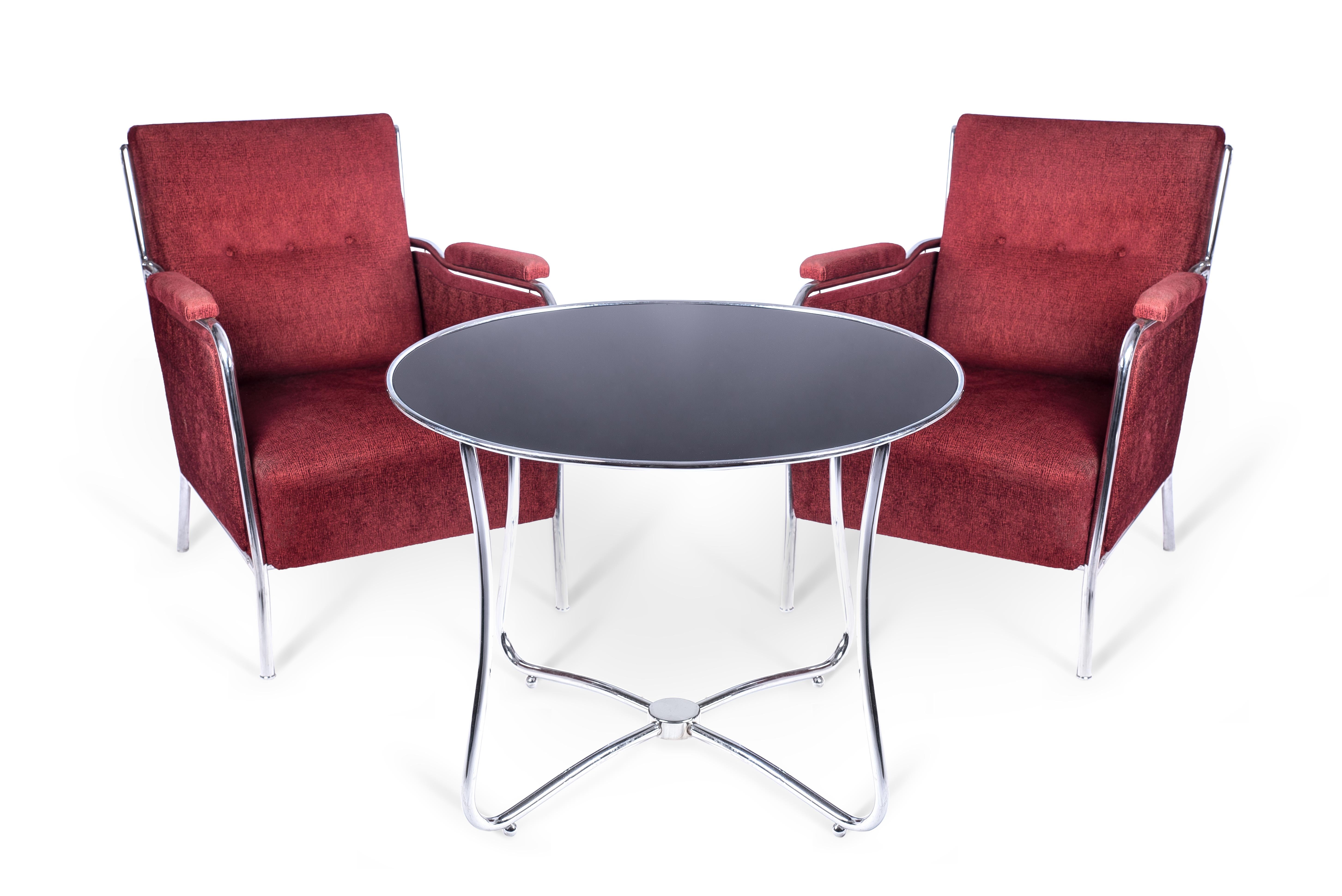 A fantastic set of period Art Deco Bauhaus style lounge chairs and sofas made in tubular steel with a design that appears as one continuous line throughout. They are very comfortable while carrying an excellent design. The set was produced by