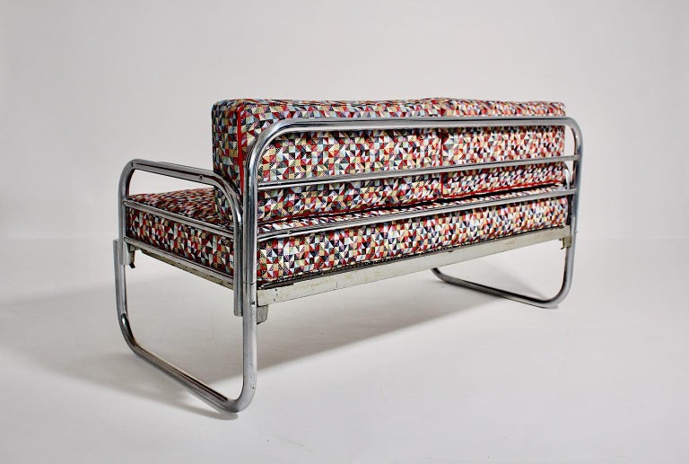 Art Deco Bauhaus vintage sofa or daybed from chromed tube steel designed by Franz Singer for Metz & Co 1920s, Austria.
While the cushions are reupholstered with spring core and covered with high quality textile fabric with kaleidoscope like pattern