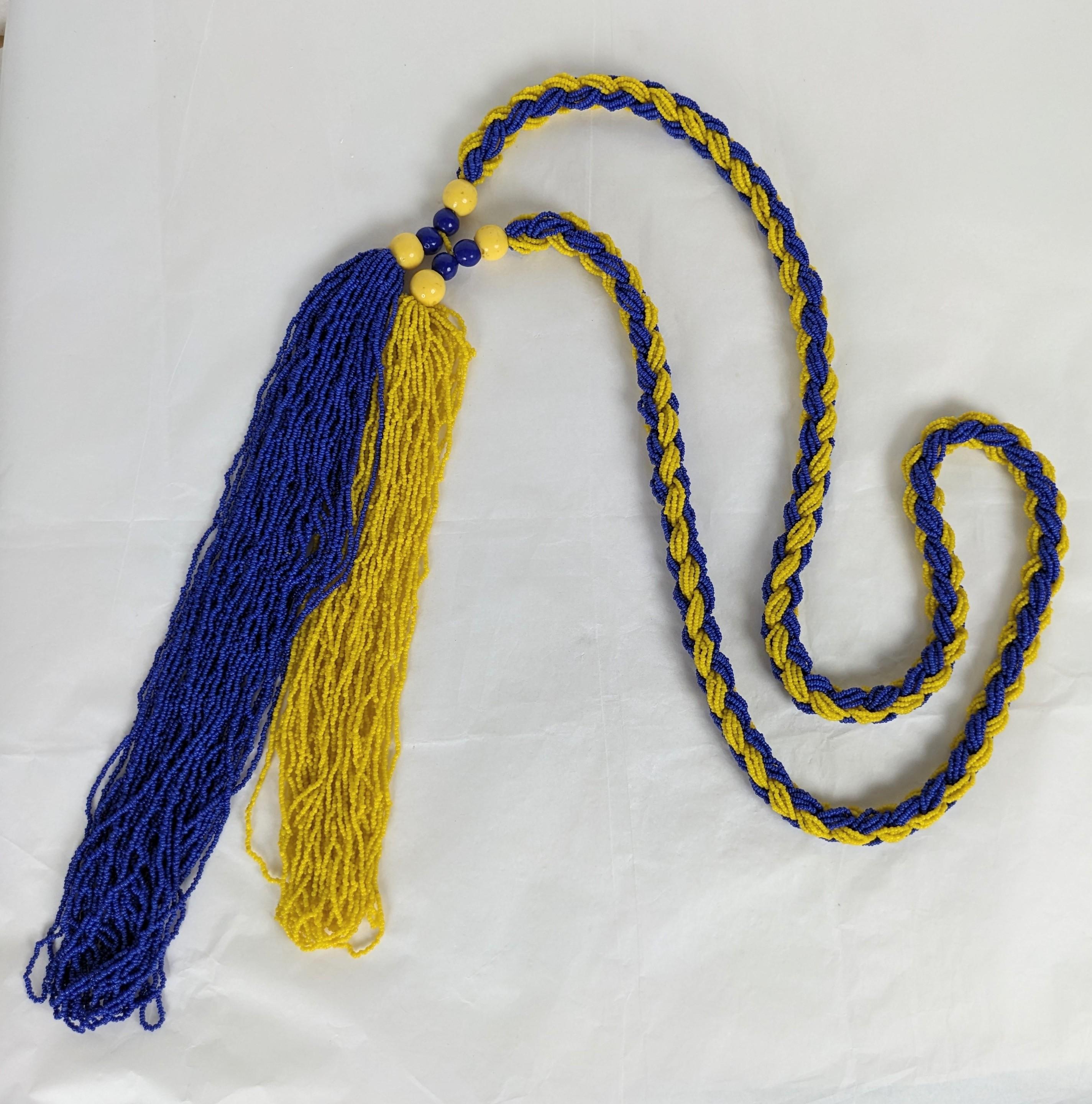 Striking Art Deco Beaded Tassel Lariat from the 1920's. Hand braided in chrome yellow and marine blue Czech seed beads with massive 2 toned tassels. 1920's Eu. Necklace 32