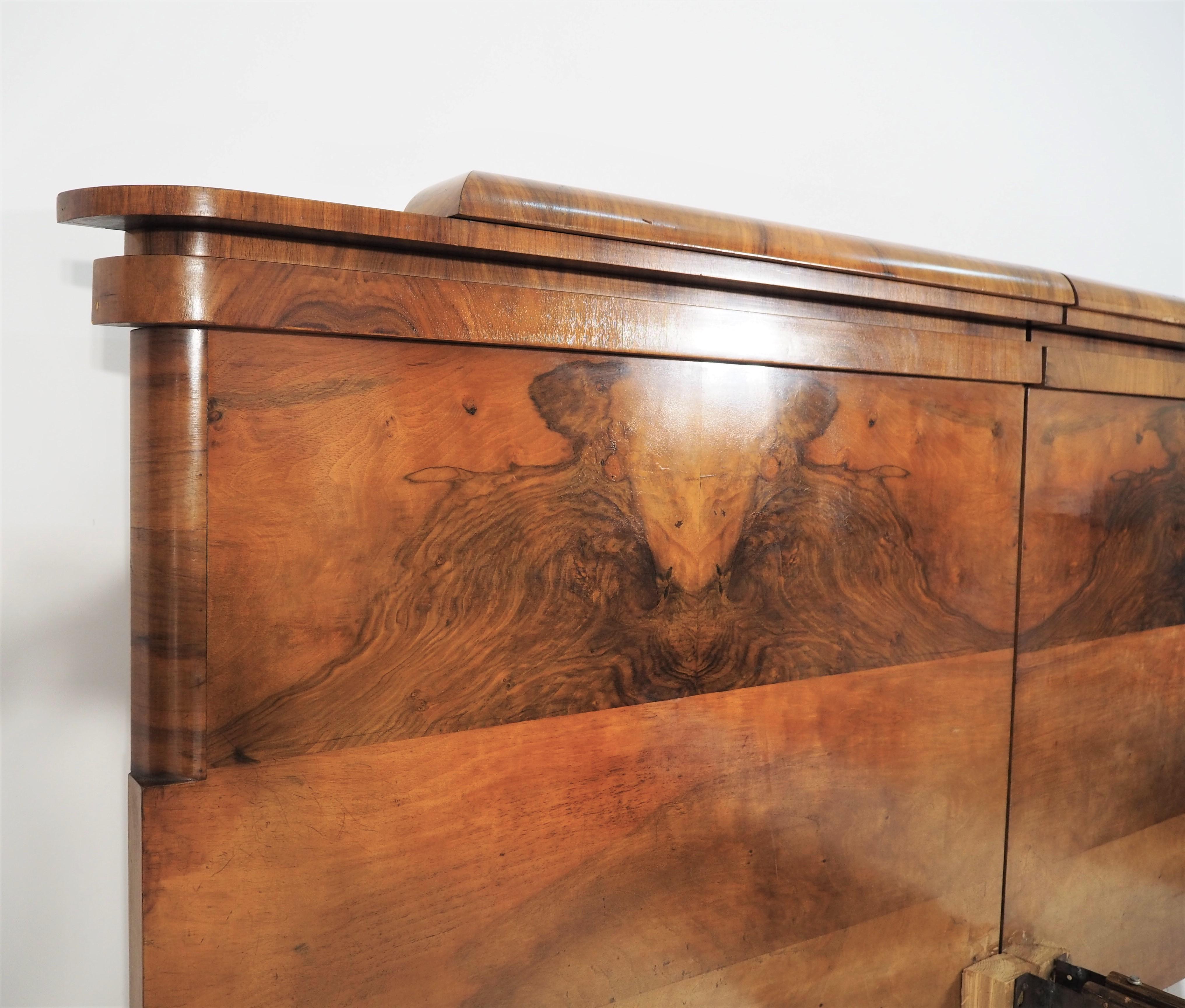 Art Deco bed, 1930s. It is veneered with walnut.