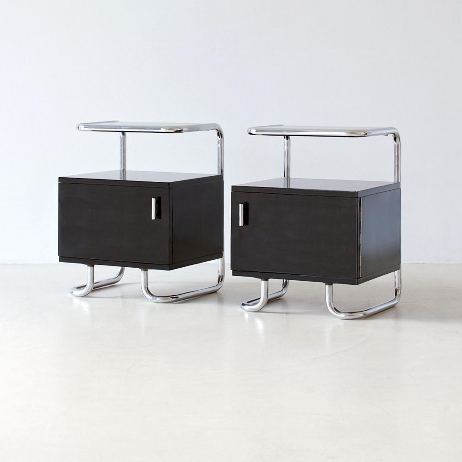 Modernist bedside cabinets pair in black glossy lacquered wood and chromium plated tubular steel, circa 1930