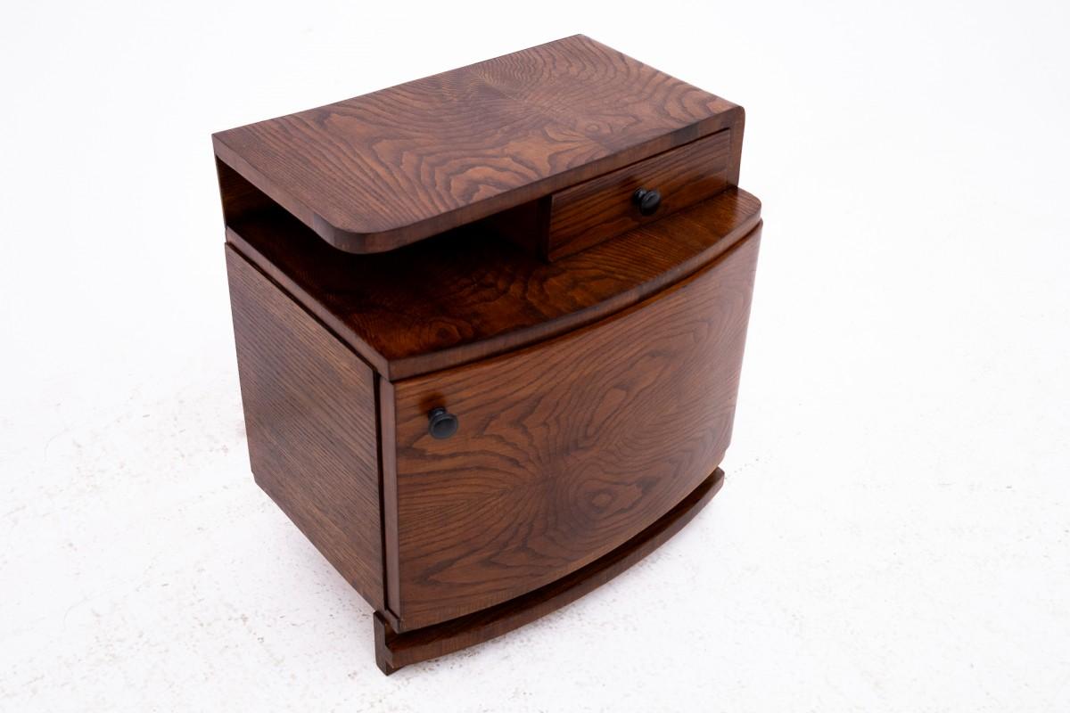 Art Deco table from the 1950s, Poland.

The furniture is in very good condition, after professional renovation.

Dimensions: height 56 ​​cm / width 52 cm / depth 38 cm