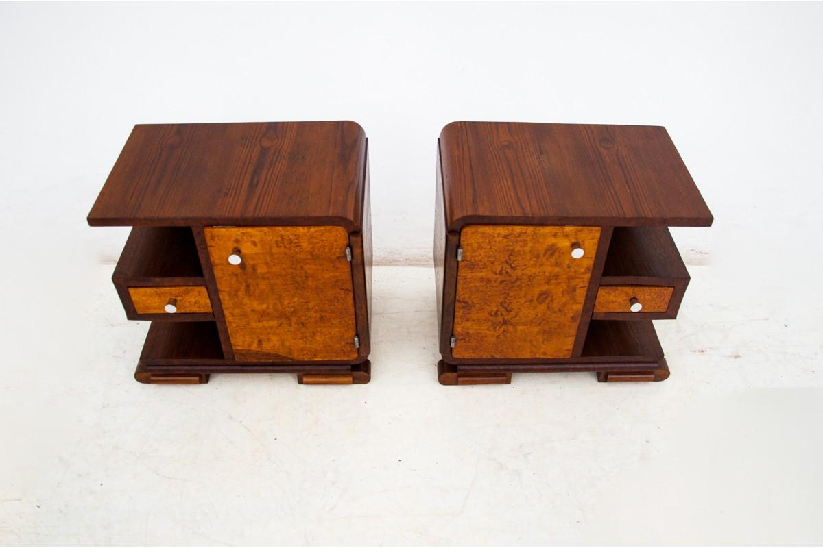 Art Deco bedside tables, Poland, 1940s

Very good condition, after professional renovation.

Wood: walnut + oak

Dimensions: height 52 cm, width 57 cm, depth 38 cm.