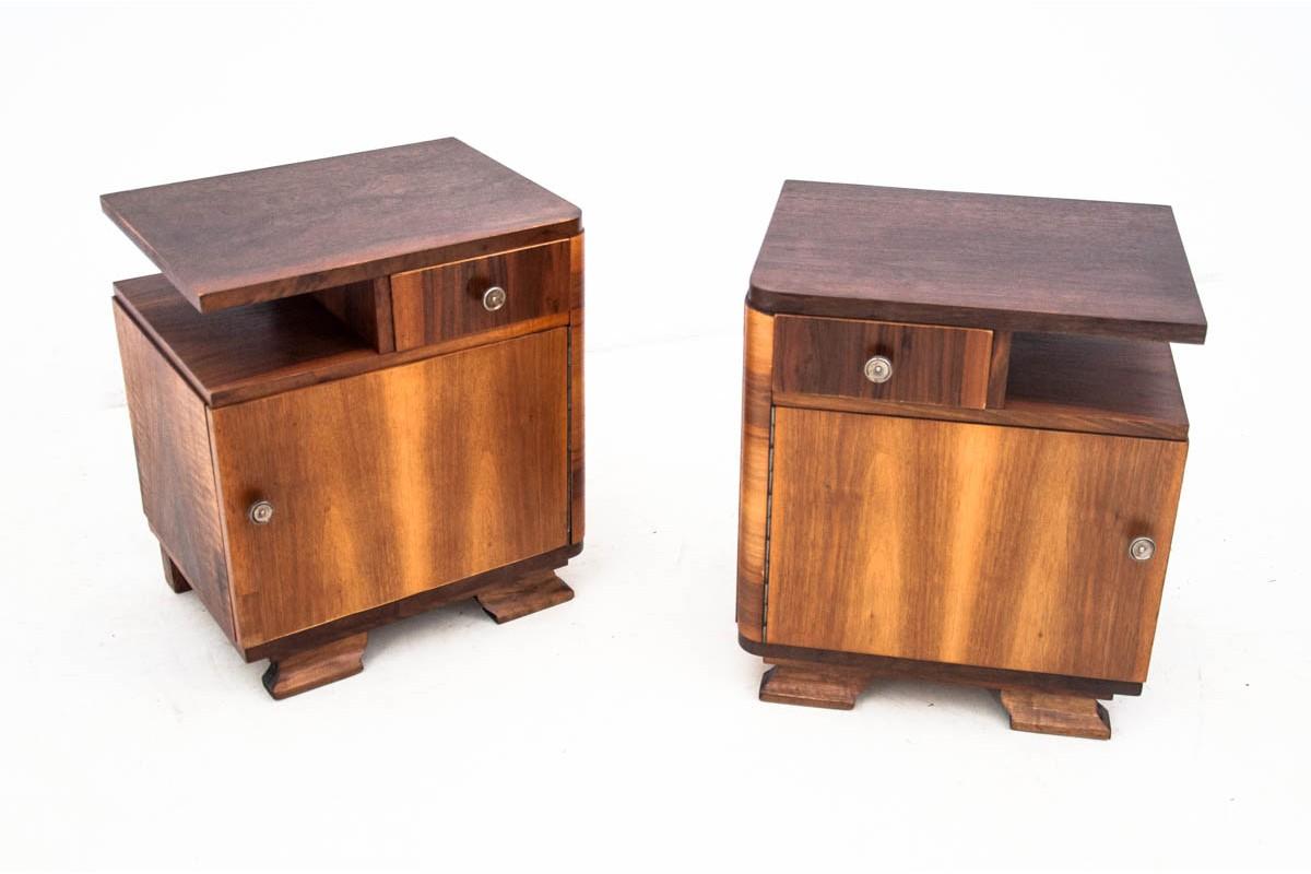 Art Deco bedside tables, Poland, 1960s

Very good condition.

After professional renovation.

Wood: Walnut

Dimensions: Height 56 ??cm, width 49.5 cm, depth 39 cm.