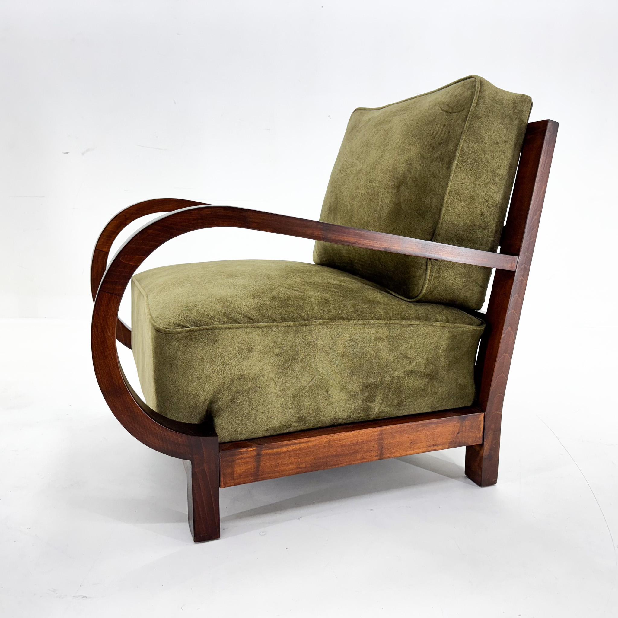 Beautiful art deco armchair newly upholstered in velvet fabric. The wooden parts have been carefully restored. 