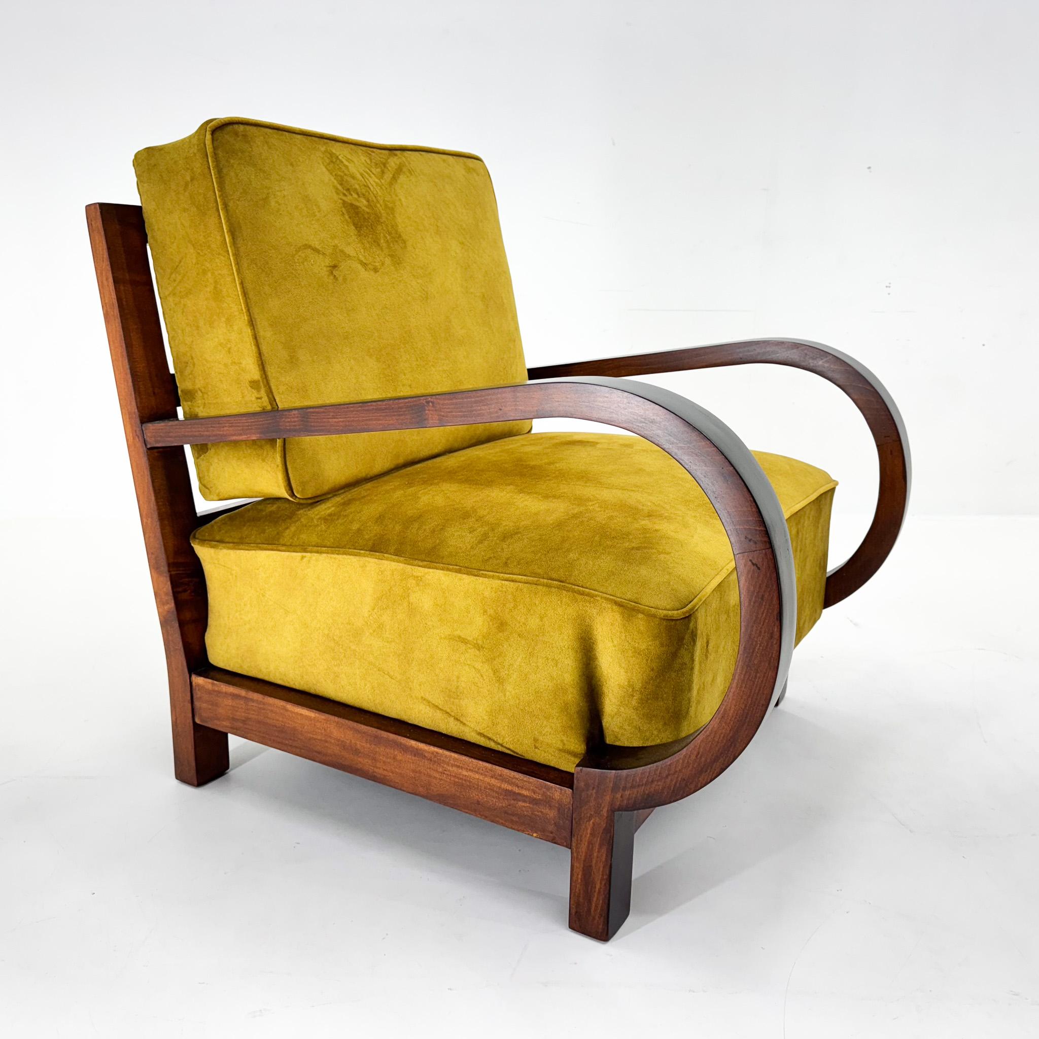 Beautiful art deco armchair newly upholstered in velvet fabric. The wooden parts have been carefully restored. 