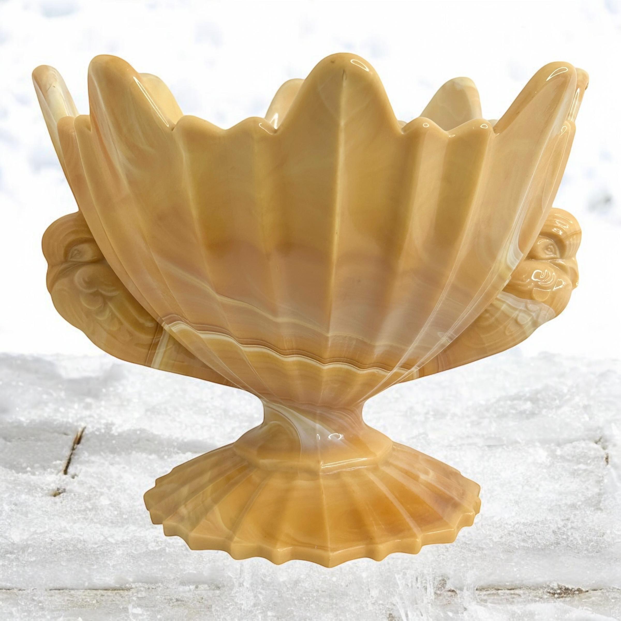 Beautiful Art Deco footed bowl with two dove handles.
Cream with beige details, marble look.
Manufactured by STS -Sjedinjene Tvornice Stakla (United Glass Factories)
This factory was founded in 1921 by the Austrian Adler family.
Very good vintage