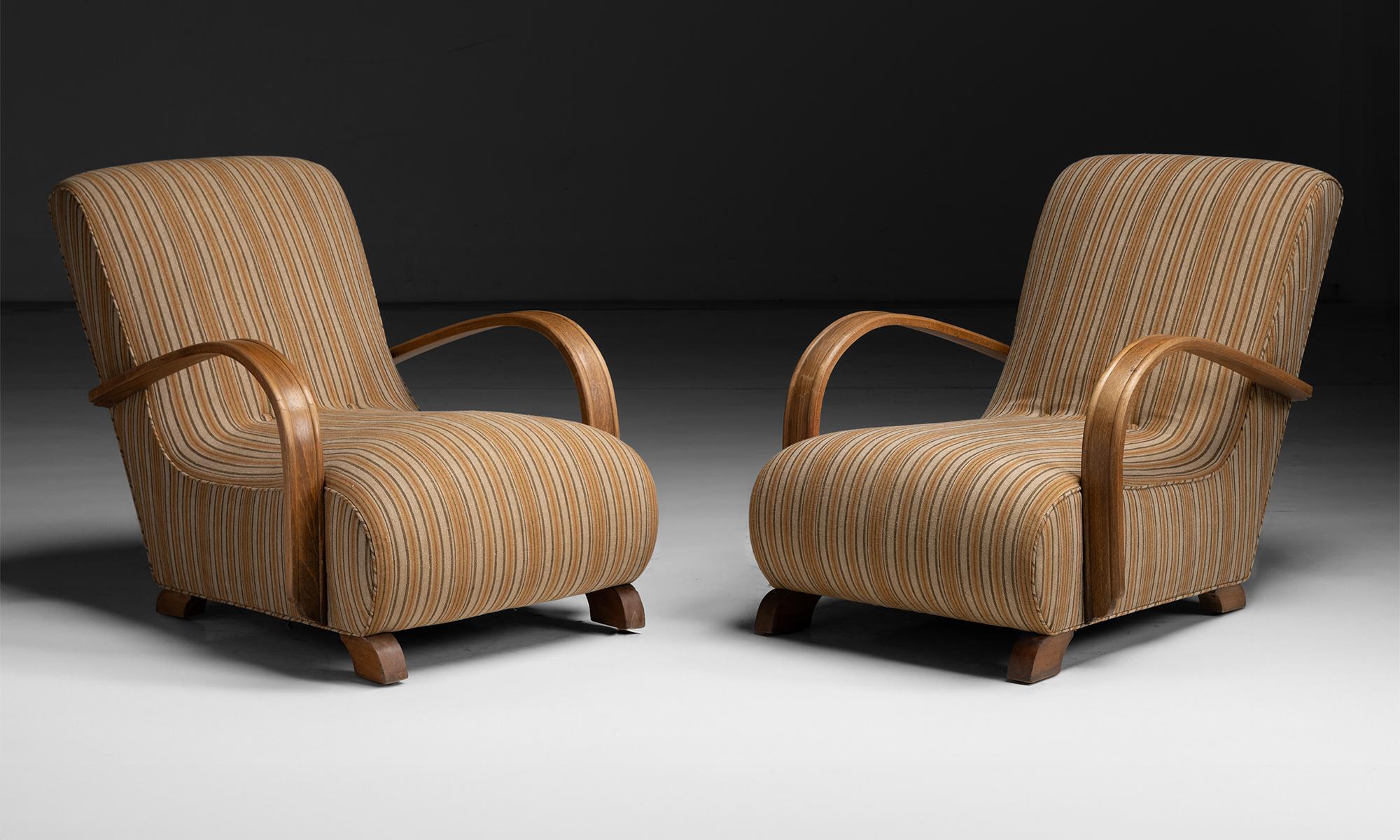 Art Deco Bentwood Armchairs

England circa 1930

Newly upholstered in striped 100% linen by de Le Cuona

27”w x 43”d 30”h x 13”seat