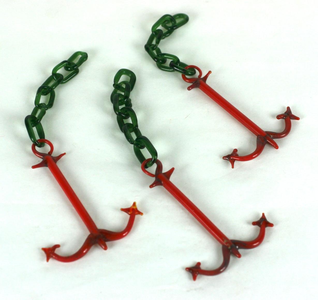 Delicate Bimini Hand blown glass anchors with chains from the 1930s Germany. Paper thin glass blown in an anchor motif with glass chain. We think these would work well in an aquarium or diorama. 
Approx 4.5