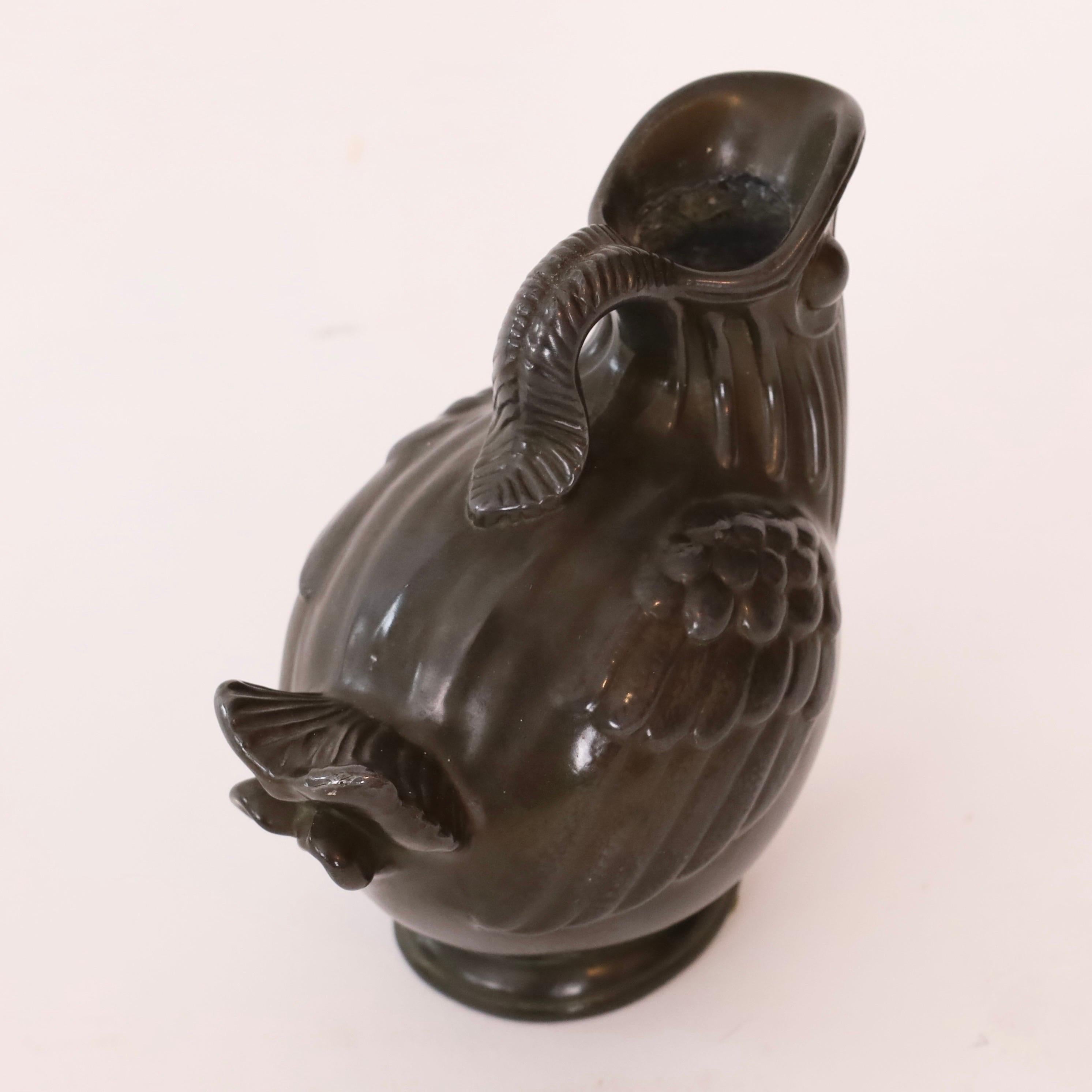 Metal Art deco bird-shaped vase by Just Andersen, 1930s, Denmark For Sale