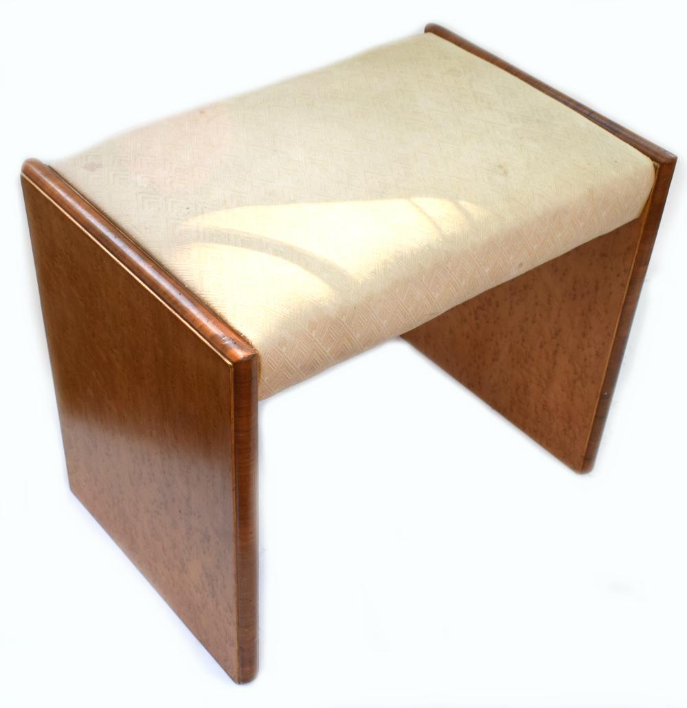 For your consideration is this 1930s Art Deco stool, beautifully veneered in blonde bird's-eye Maple and Walnut feather banding edging. We've had the stool restored and so is in great condition. We haven't reupholstered so the material on the