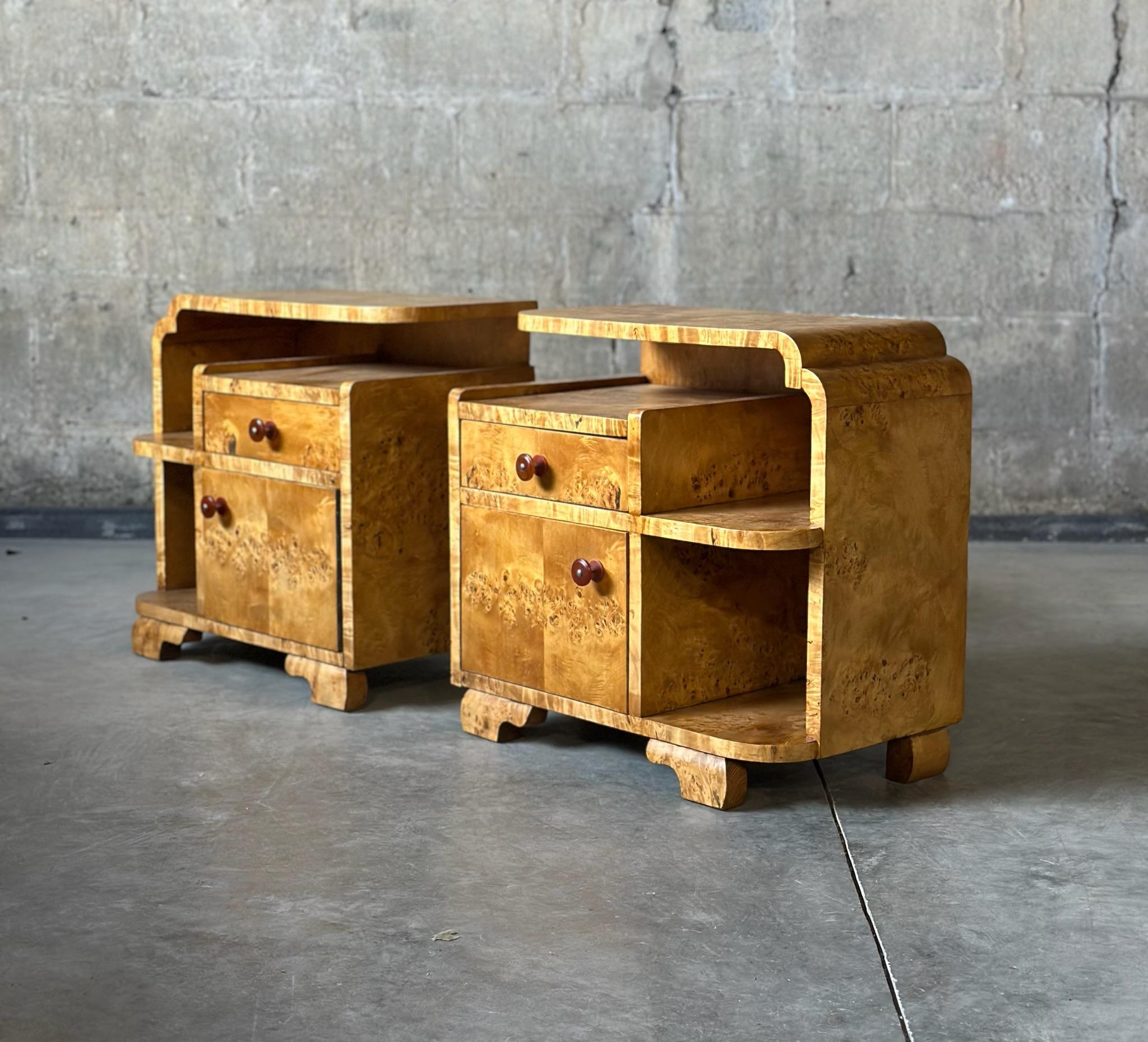 Birds Eye Maple nightstands, a pair. Asymmetrically designed shelving makes for interesting pieces.