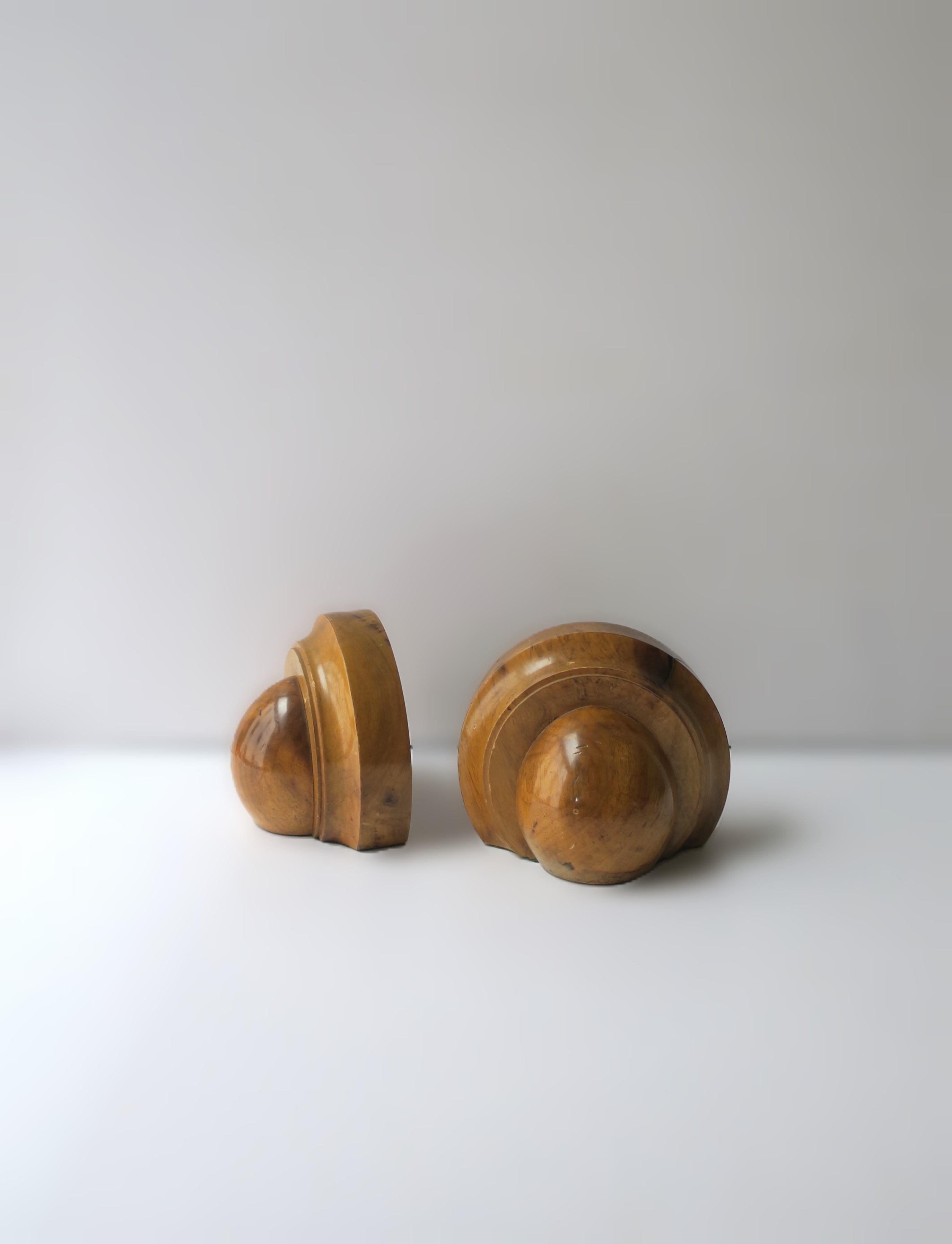 A pair of Birdseye maple wood bookends, Art Deco period, circa early-20th century. Dimensions: 3.75
