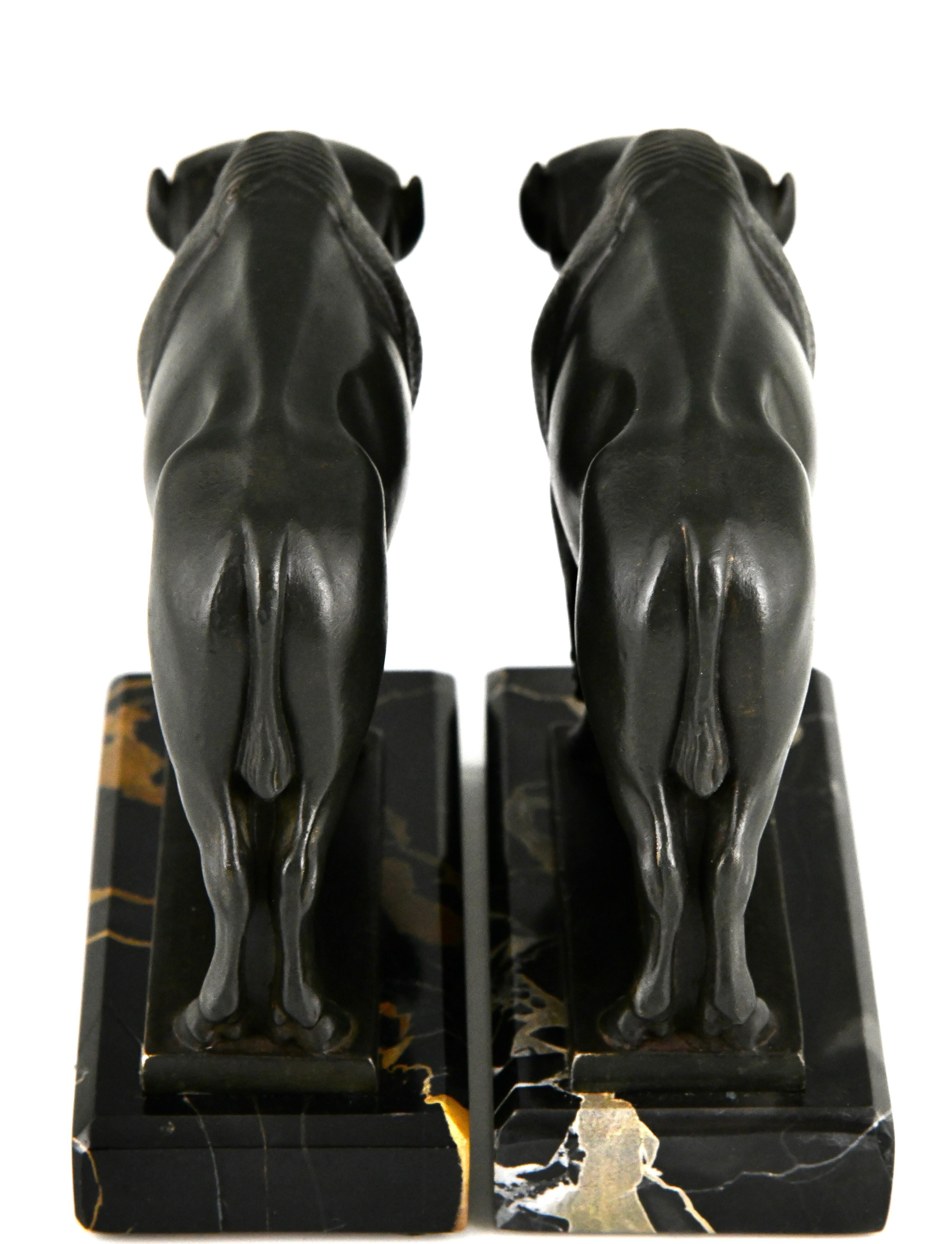 Mid-20th Century Art Deco bison bookends by Max Le Verrier original 1930 on Portor marble base.  For Sale