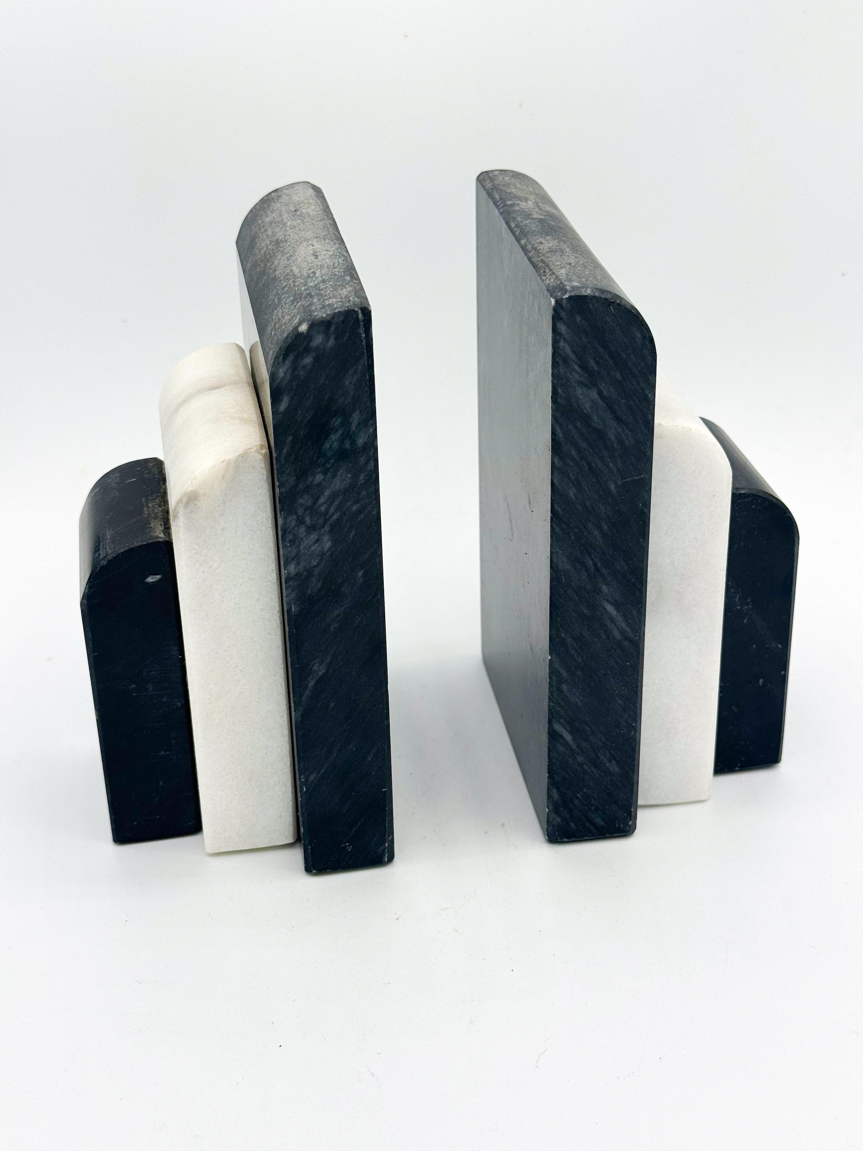 This striking pair of vintage Art Deco marble bookends embodies both elegance and history. Crafted in Italy from high-quality black and white marble, their geometric stepped design adds a sophisticated touch to any mid-century modern, Art Deco, or