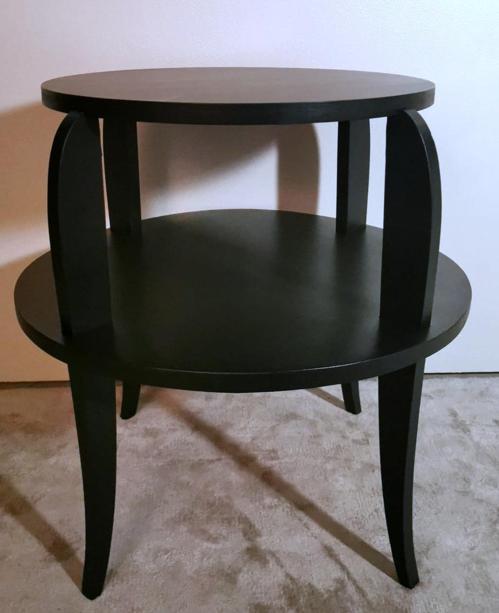 We kindly suggest that you read the whole description, as with it we try to give you detailed technical and historical information to guarantee the authenticity of our objects.
A peculiar and original round French tea/coffee table made of black
