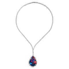 Art Deco Black Harlequin Opal and Diamond Pendant Set in Platinum