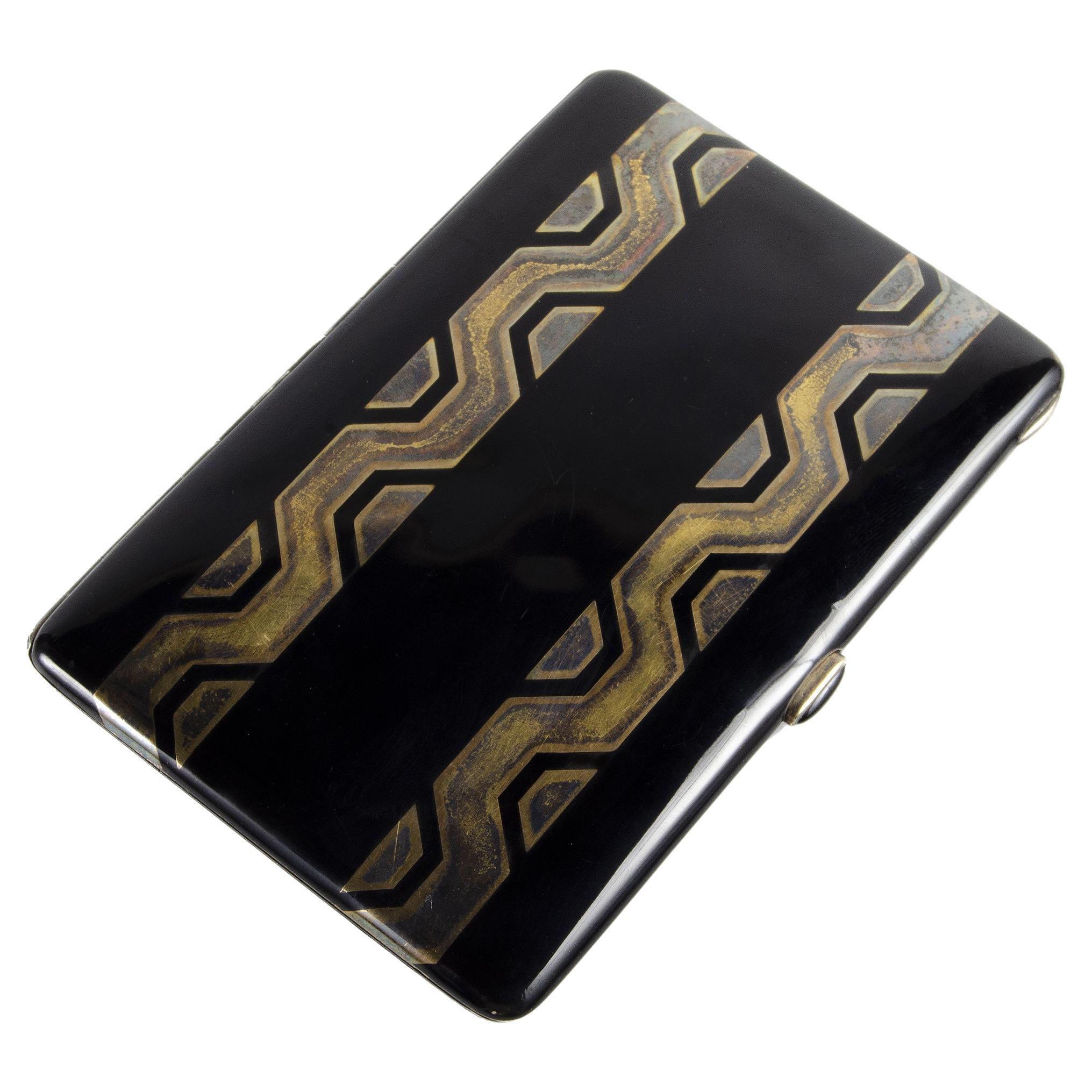Etui à cigarettes Art Déco en laque noire et bronze doré par Jean Dunand, France en vente