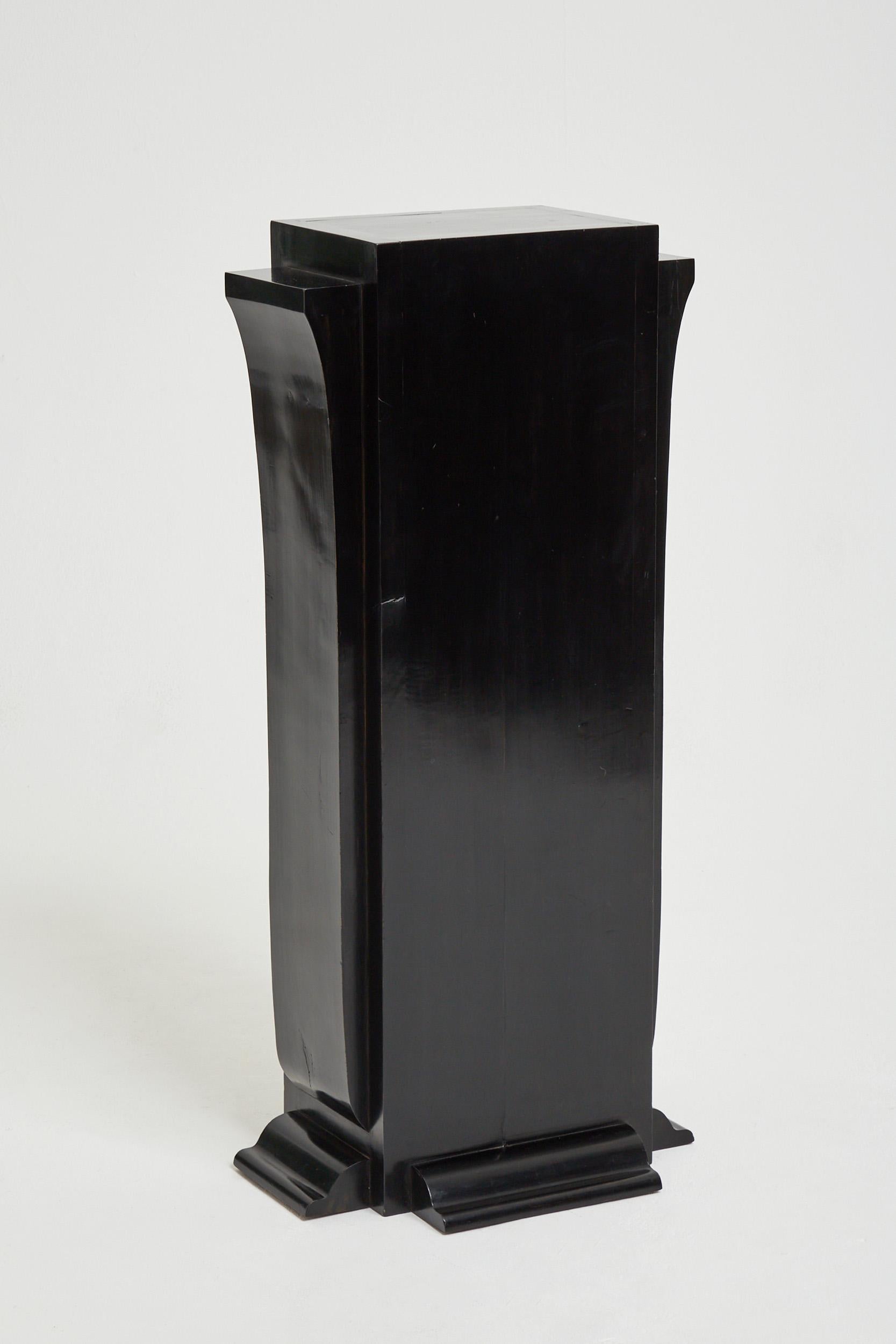 An Art Deco black lacquer pedestal
France, Circa 1930.