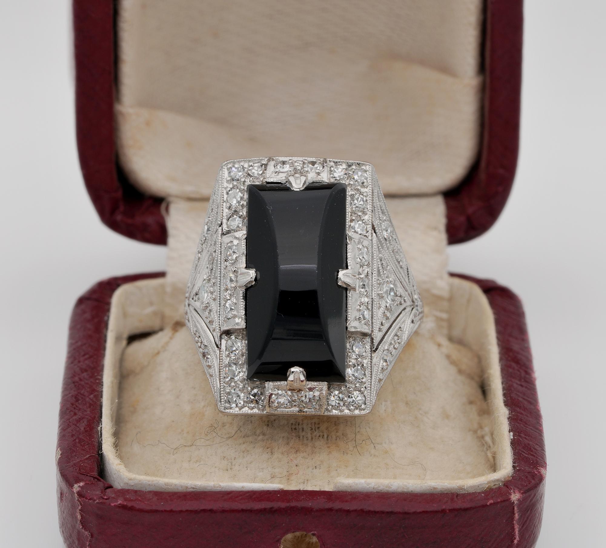 Black & White Elegance
Art Deco Black Onyx Diamond striking and dramatic design artfully rendered in Platinum
English maker mark active from 1931 to 1941
Custom cut elongate, polished Black Onyx stone of 17 mm. x 8 mm. set in a Diamond with carved